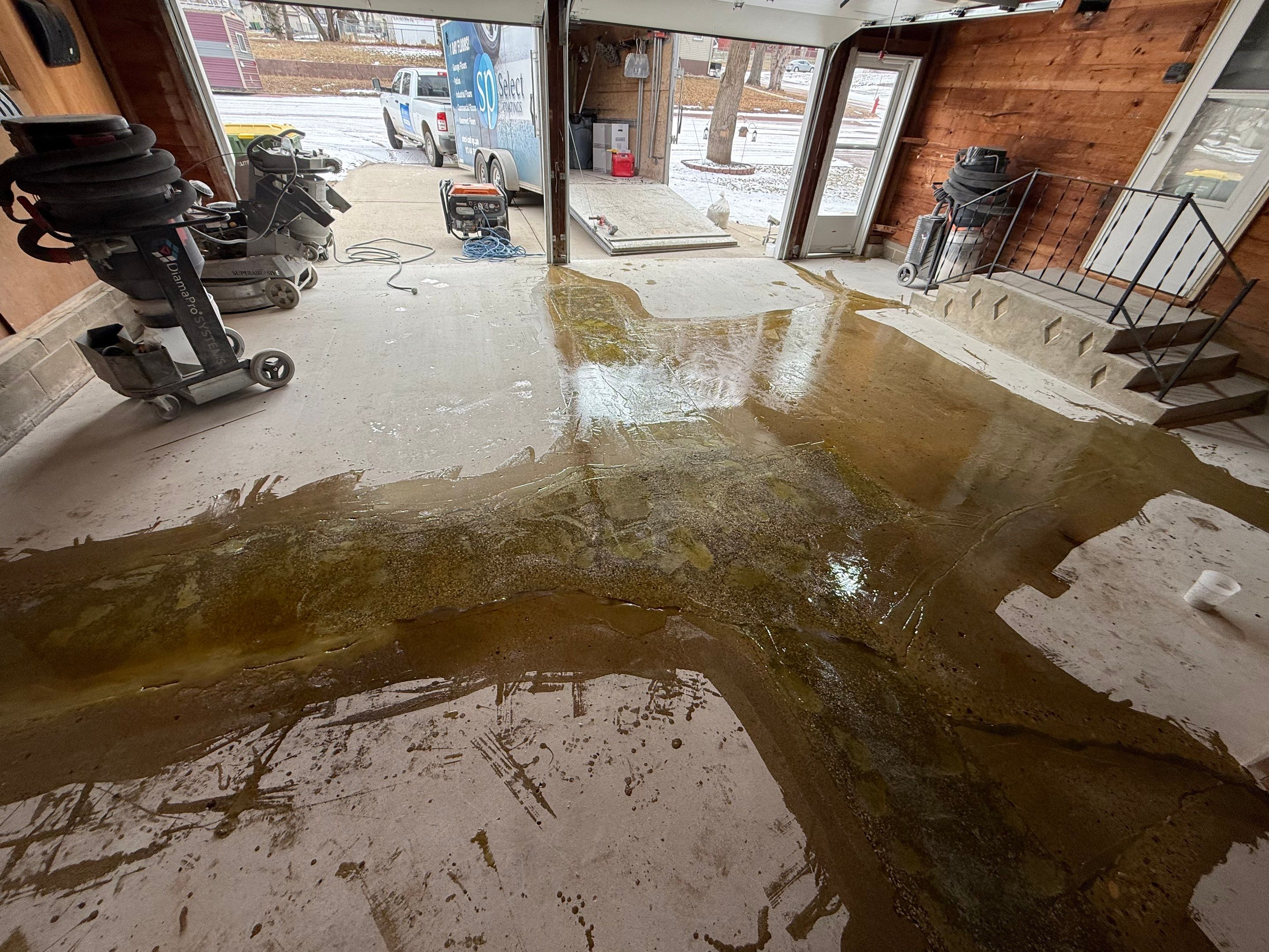 Multi-Colored Epoxy Garage Floor Coating and Concrete Stair Restoration by Select Painting, Coatings & Garage Cabinets