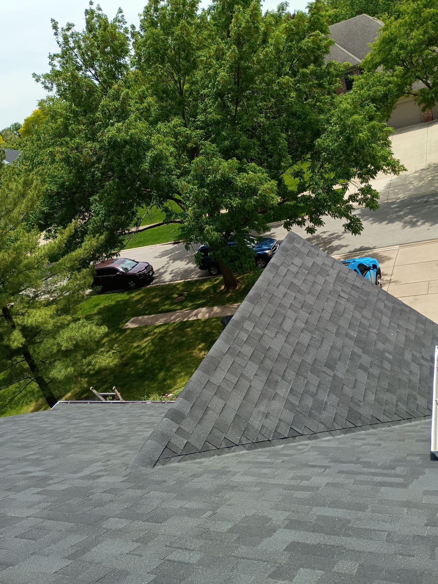Asphalt Shingle Roof Replacement and Skylight Installation in Darien by Pro Home Services Inc
