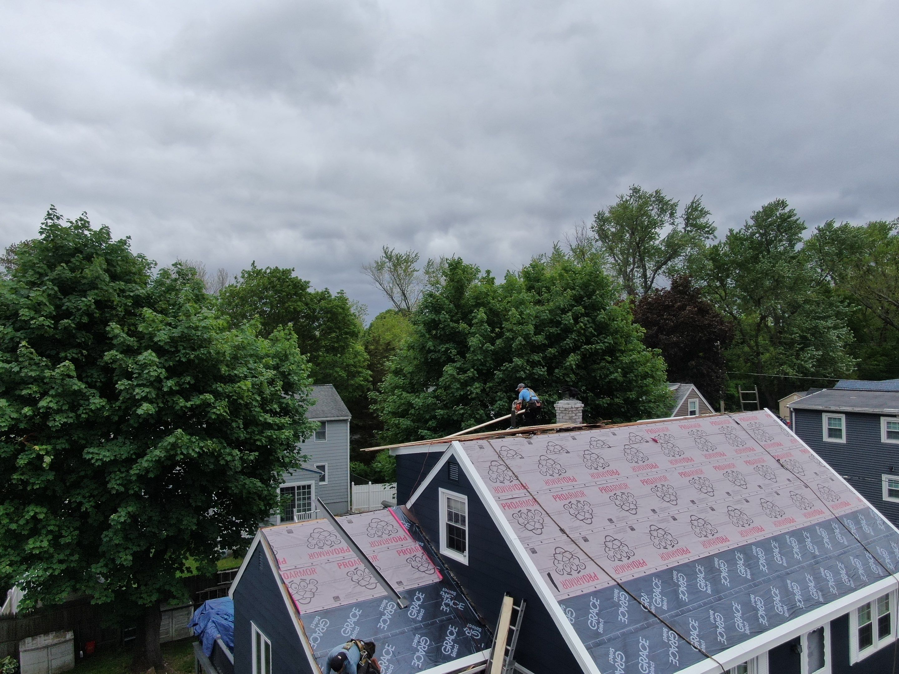 Roof and Flat Roof Membrane Replacement in Lowell, MA by Mighty Dog Roofing of Greater Middlesex County