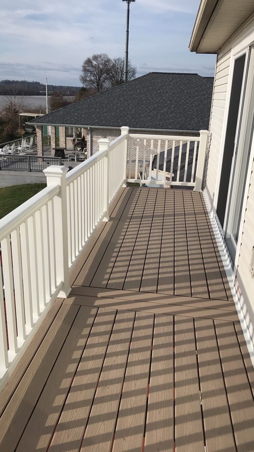 Deck Refurbush and Door Replacement using Trex Decking and Railing. Polaris Patio Doors by Secure Construction Company Inc
