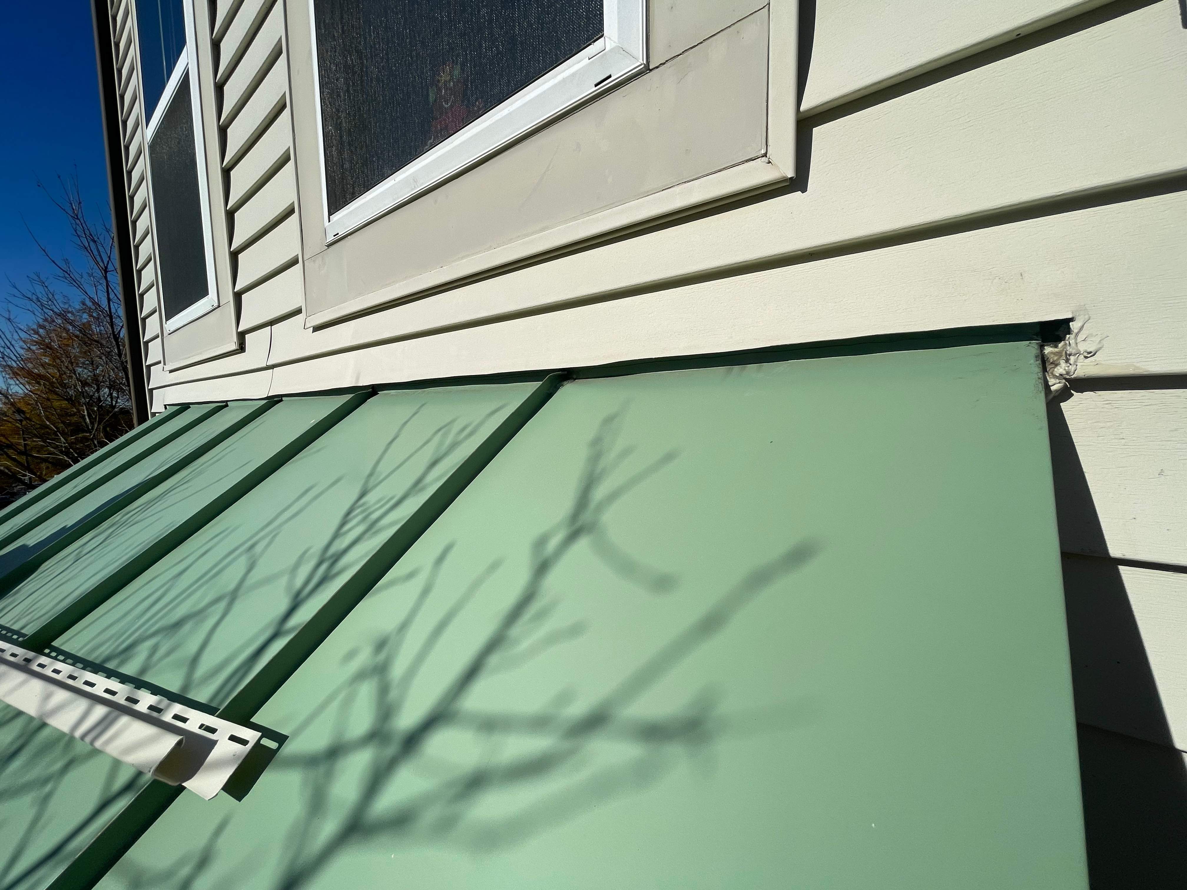 Siding Repair using CertainTeed J-Channel & Caulk by RJC General Construction, LLC.