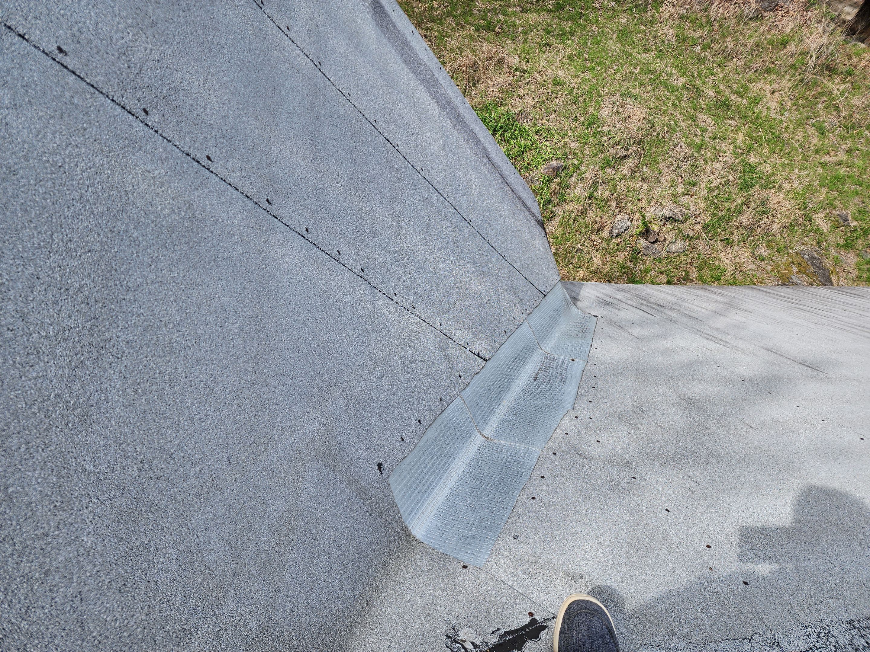 Residential Roofing Installation using 26 Gauge Colored Panels by Hostetler Roofing