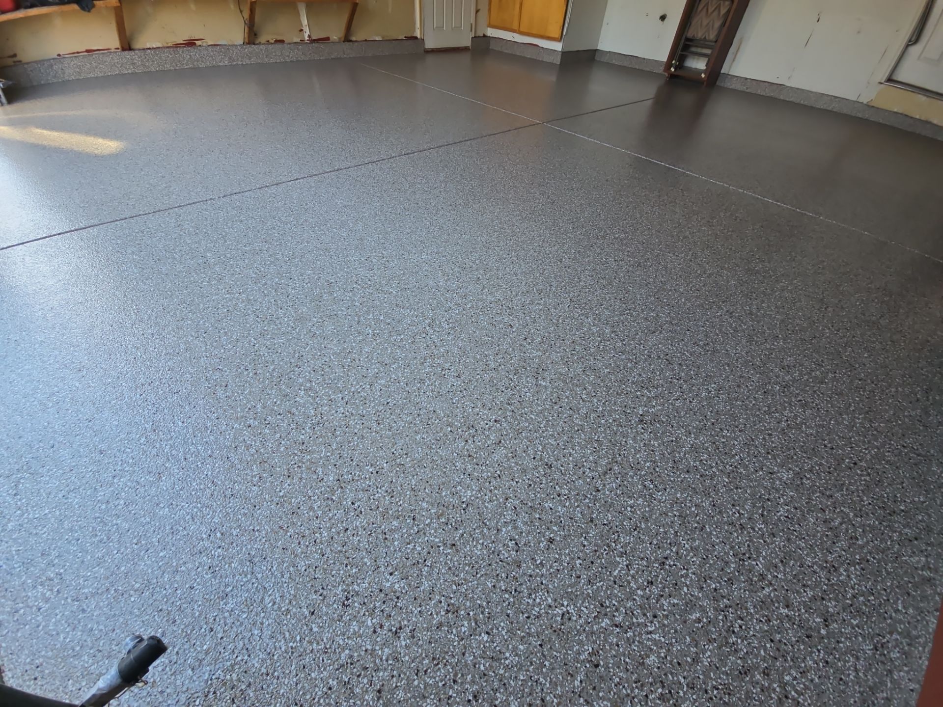 Garage Transformation using Pebble Beach by Croc Coatings, LLC