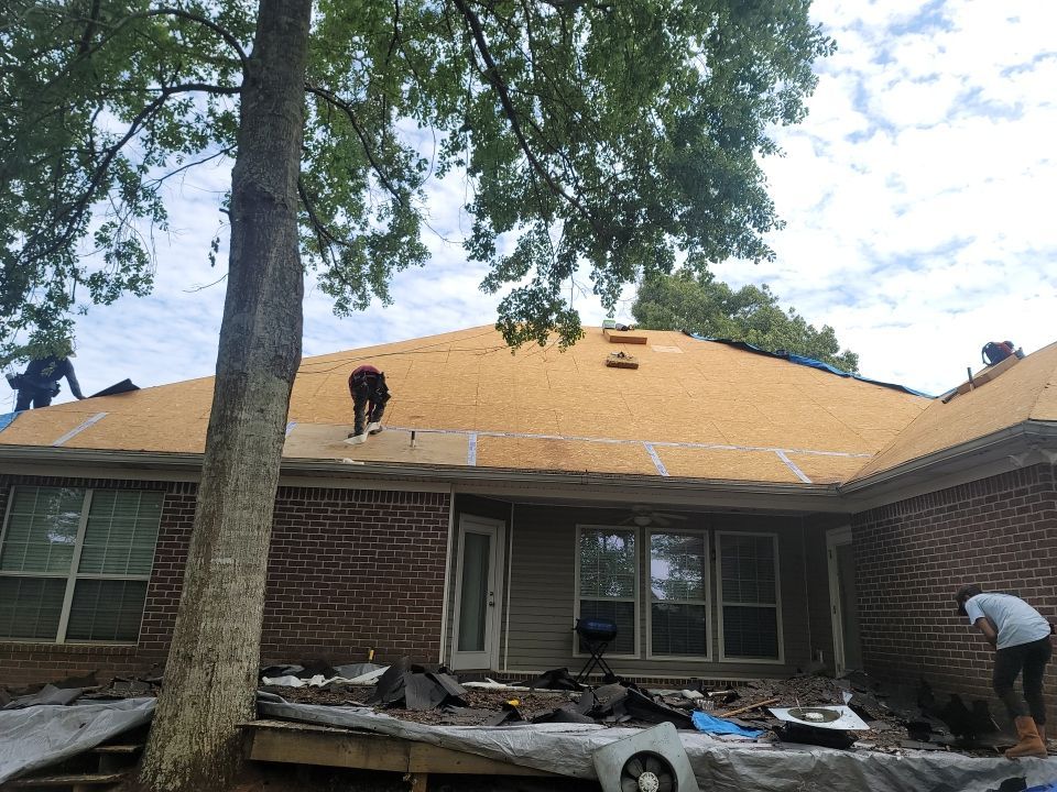 Residential Roofing Installation using Roof Replacement by American Roofing & Construction LLC