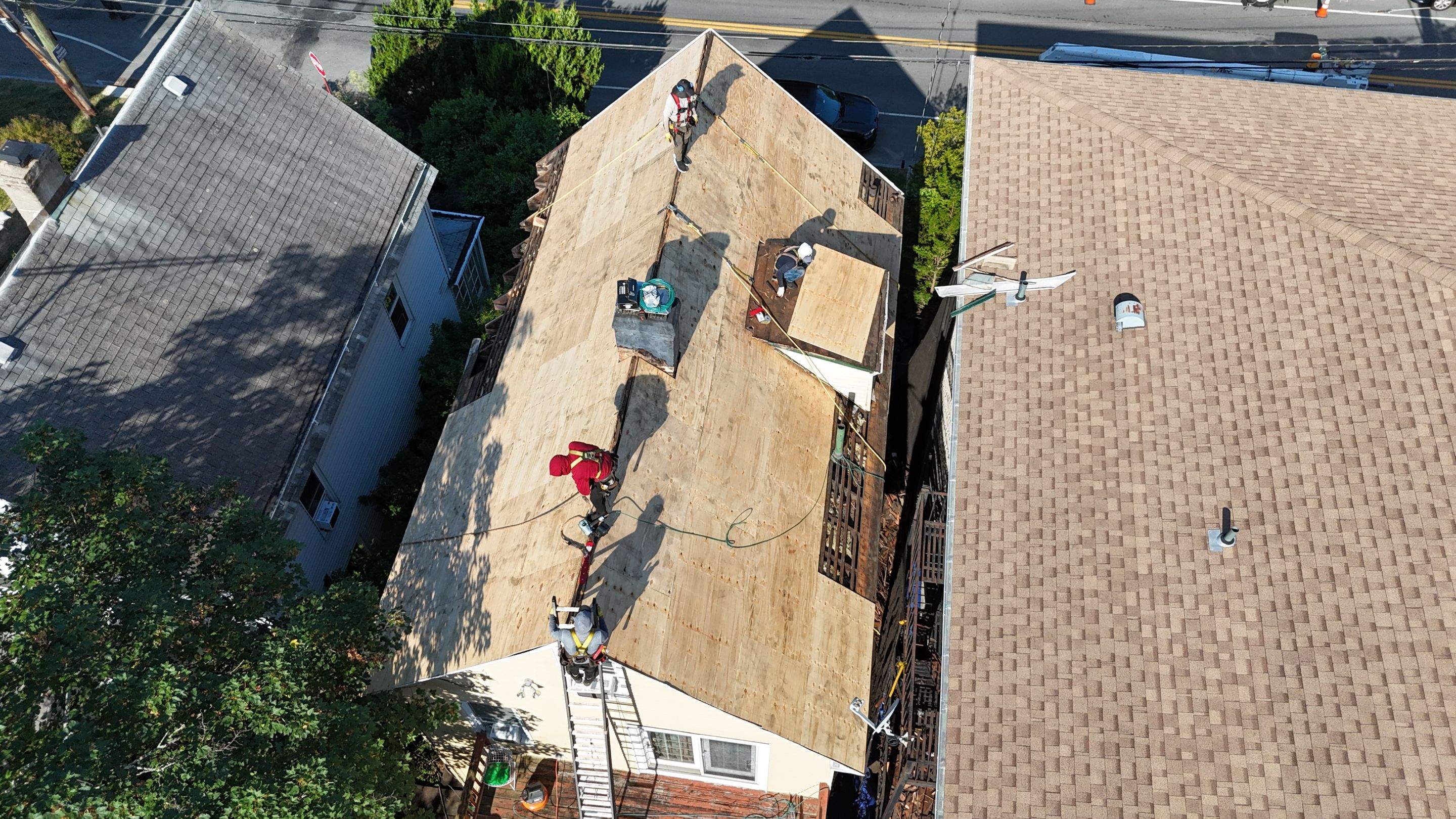 Project in Hastings-on-Hudson by The Energy Efficient Roofer & George's Seamless Gutters