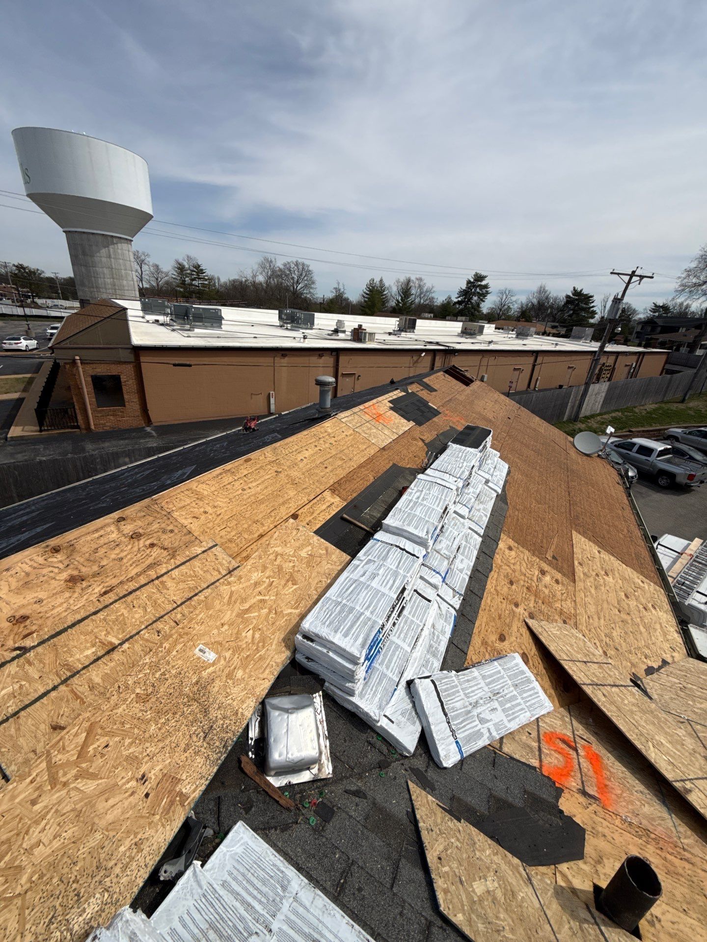 Multi-Unit Roof Replacement and Decking Repair in St. Louis by Acute Roofing And Exteriors 