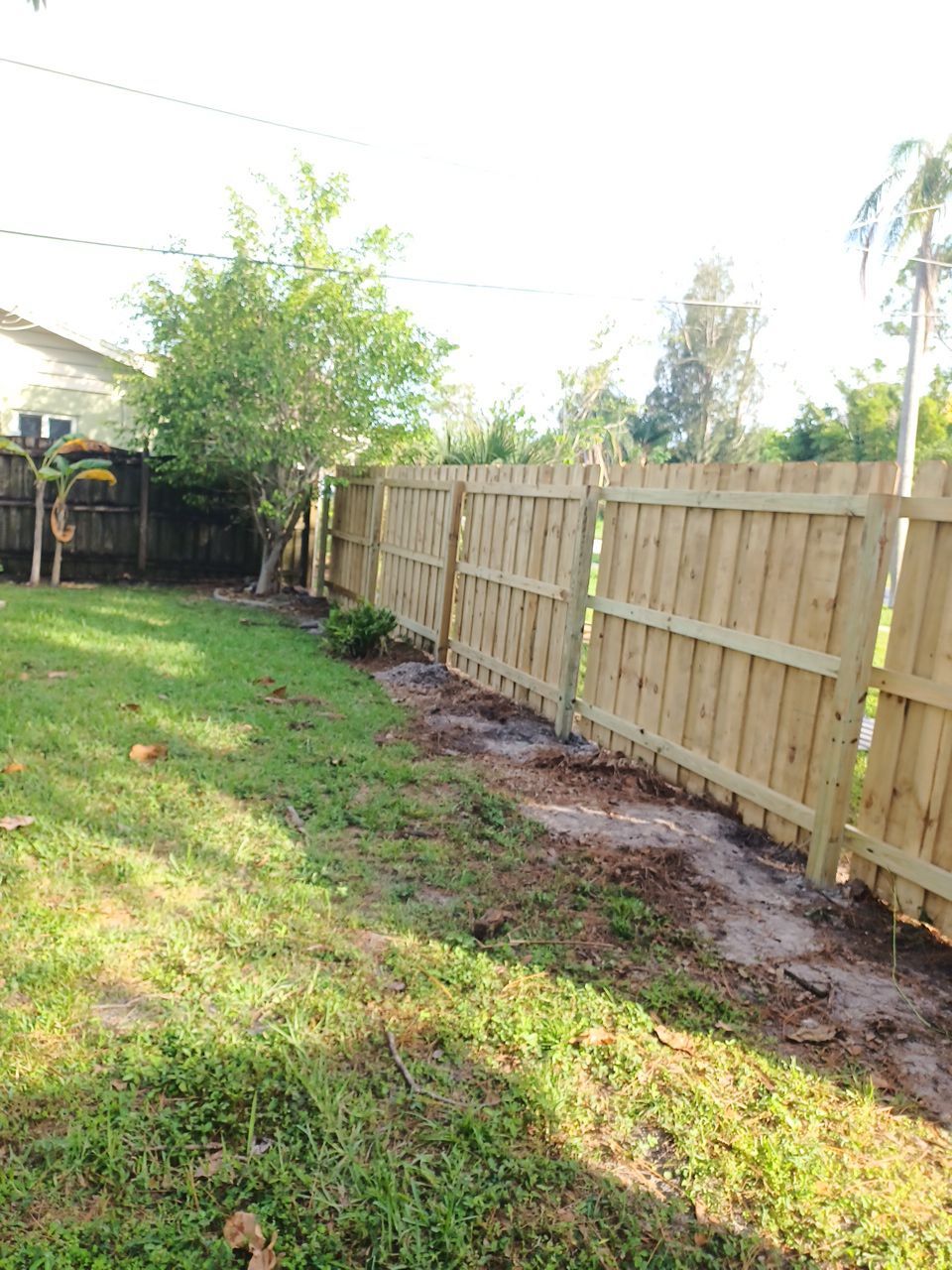 Sarasota, FL 6ft. Tall Treated Board on Board Wood Fence by Asap fence and gates, LLC