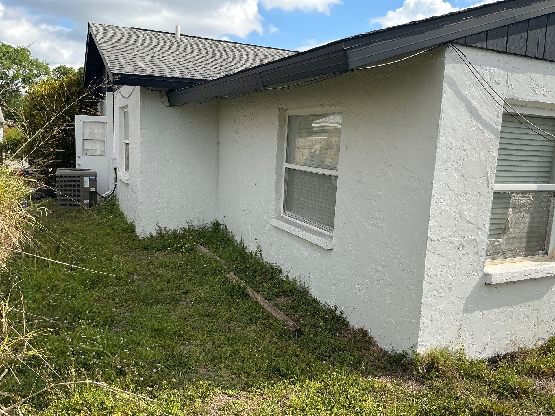 New Downspouts and Splash Guards in Sarasota FL by Gutter Professors