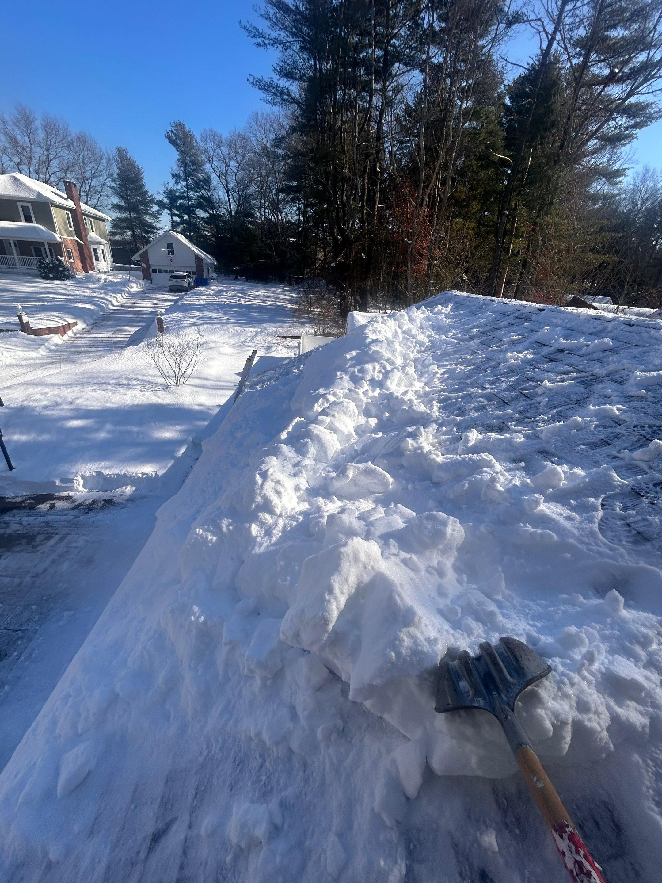 Ice dam & Snow removal by Mighty Dog Roofing of Greater Middlesex County