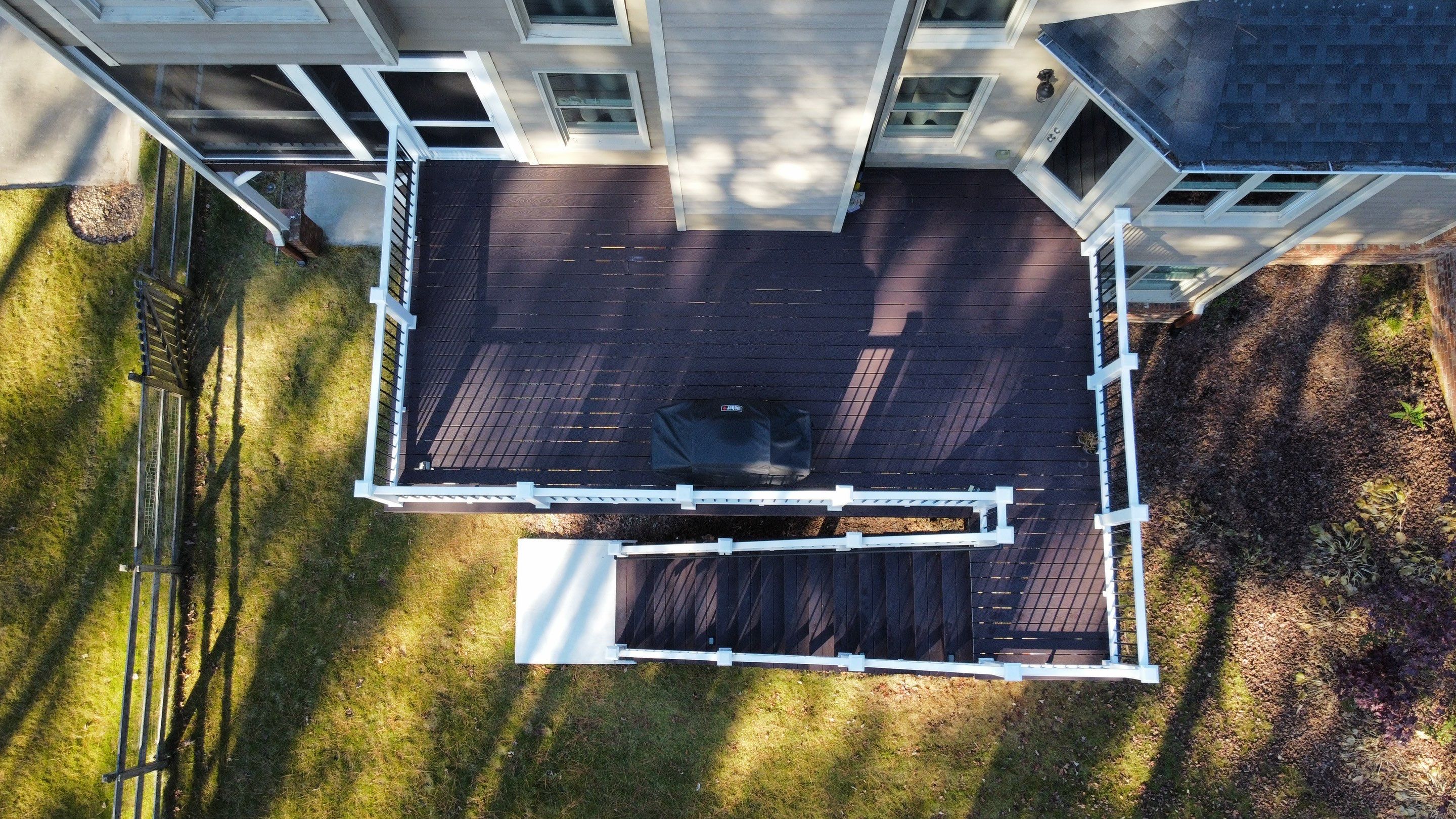 Multi-Level Composite Deck and Screened Porch in Acworth by Swift Home Renovations 