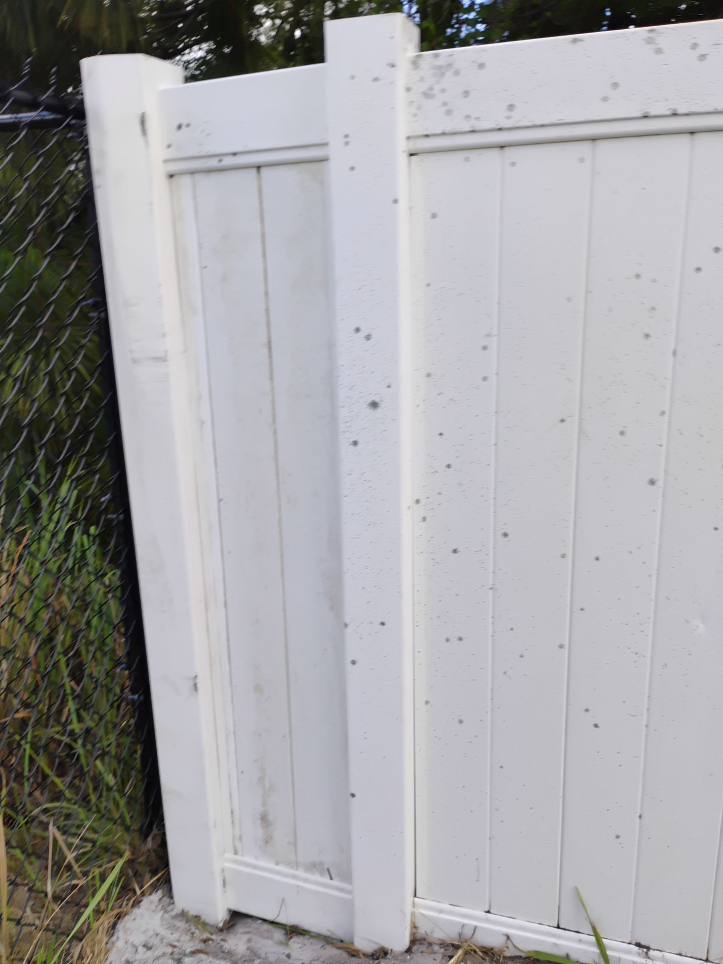 Black Chain Link and Vinyl Privacy Fence Installation in North Port by True Fence LLC