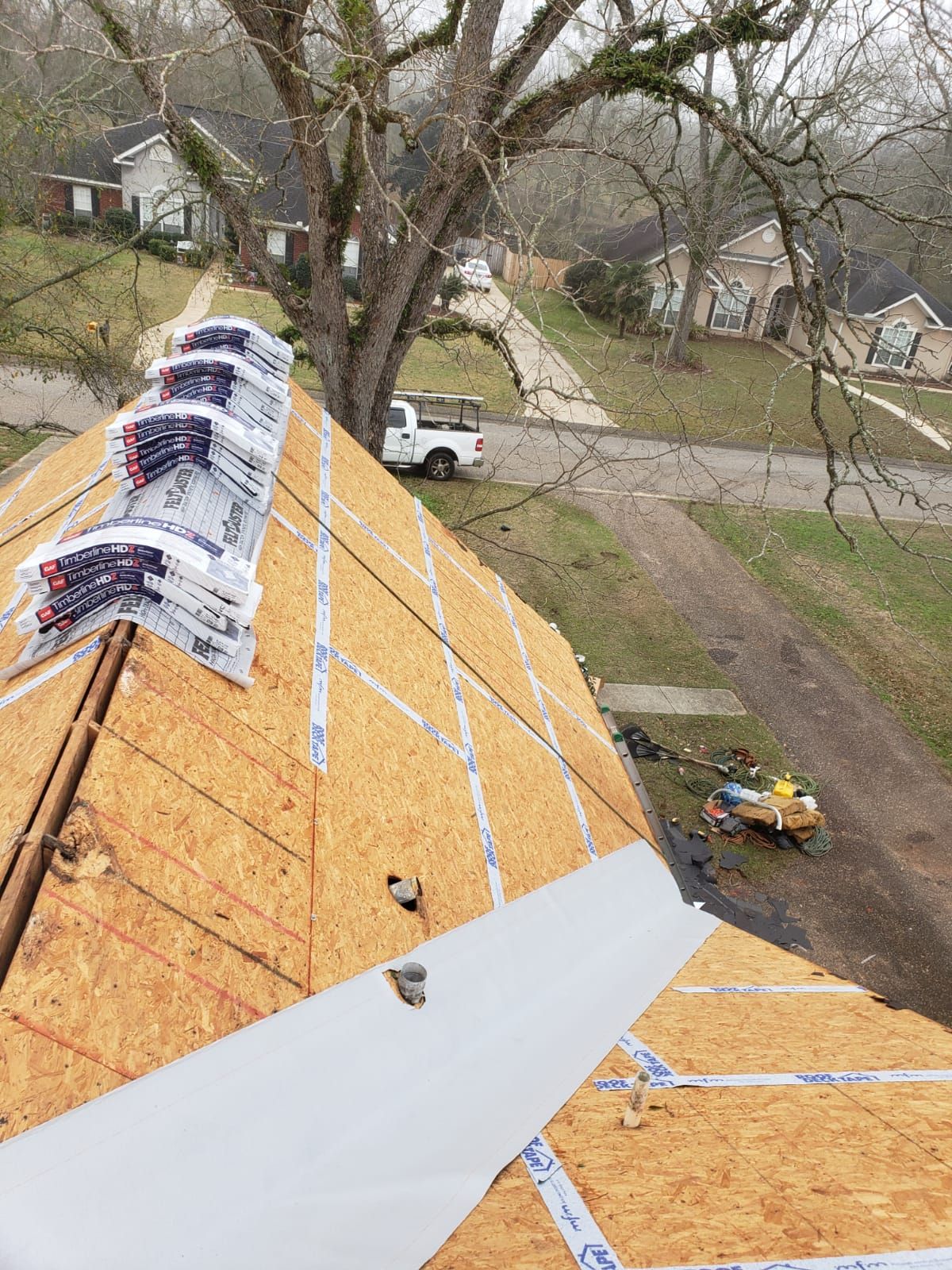 Residential Roofing Installation using Roof Replacement by American Roofing & Construction LLC