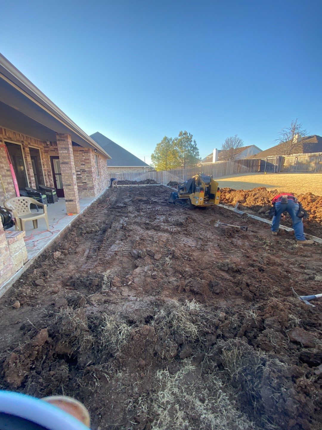 Concrete Slab , Retaining Wall , Fence, and landscape. by Clays Services Inc