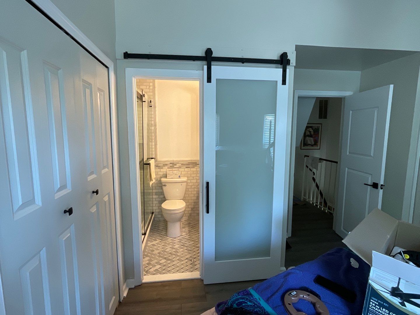 Bathroom Remodel using Two new bathroom design and new floors by Alpha Design Services