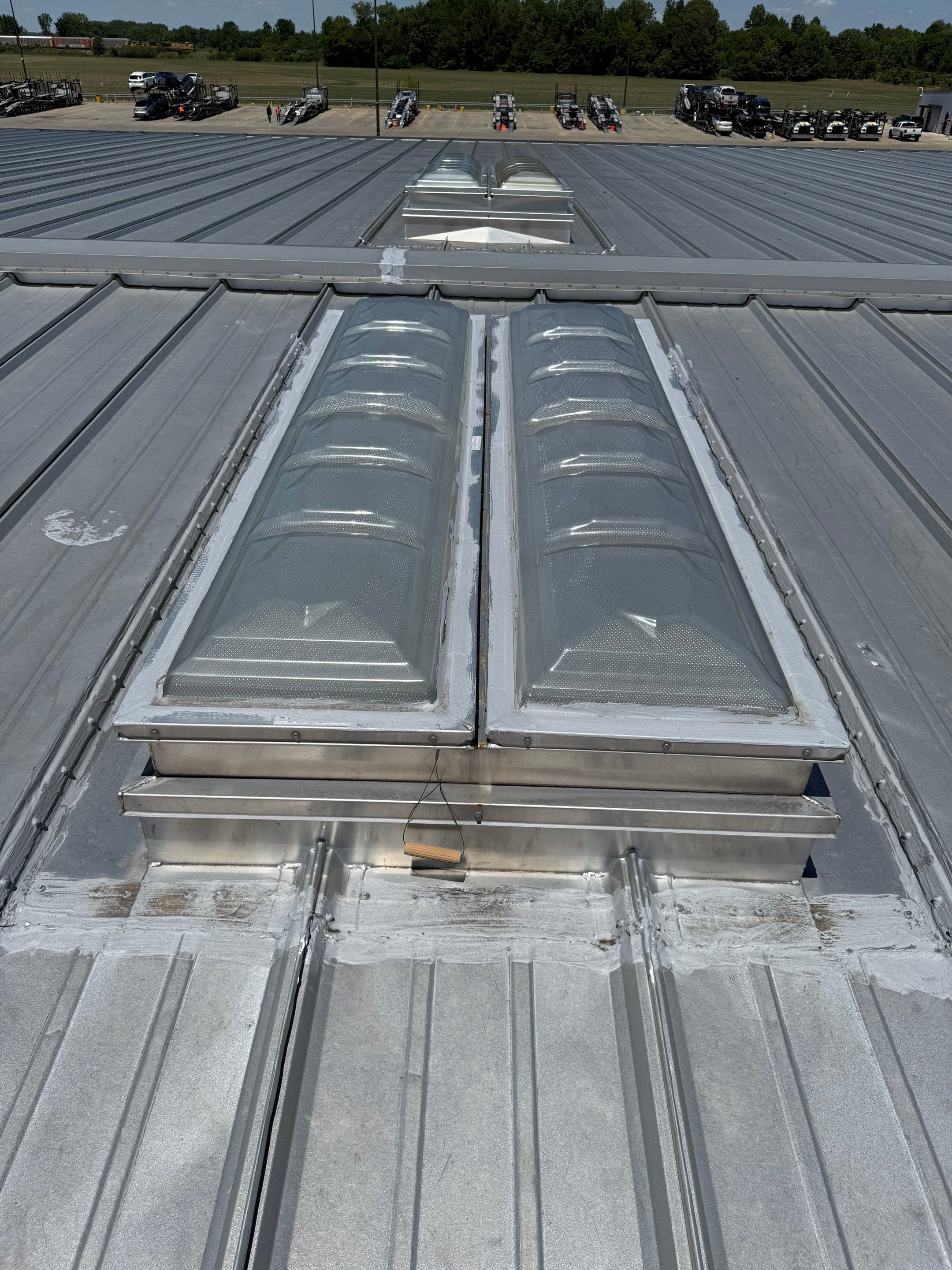 Commercial Metal Roof Repair and Skylight Sealing in West Memphis by Revival Roofing Services