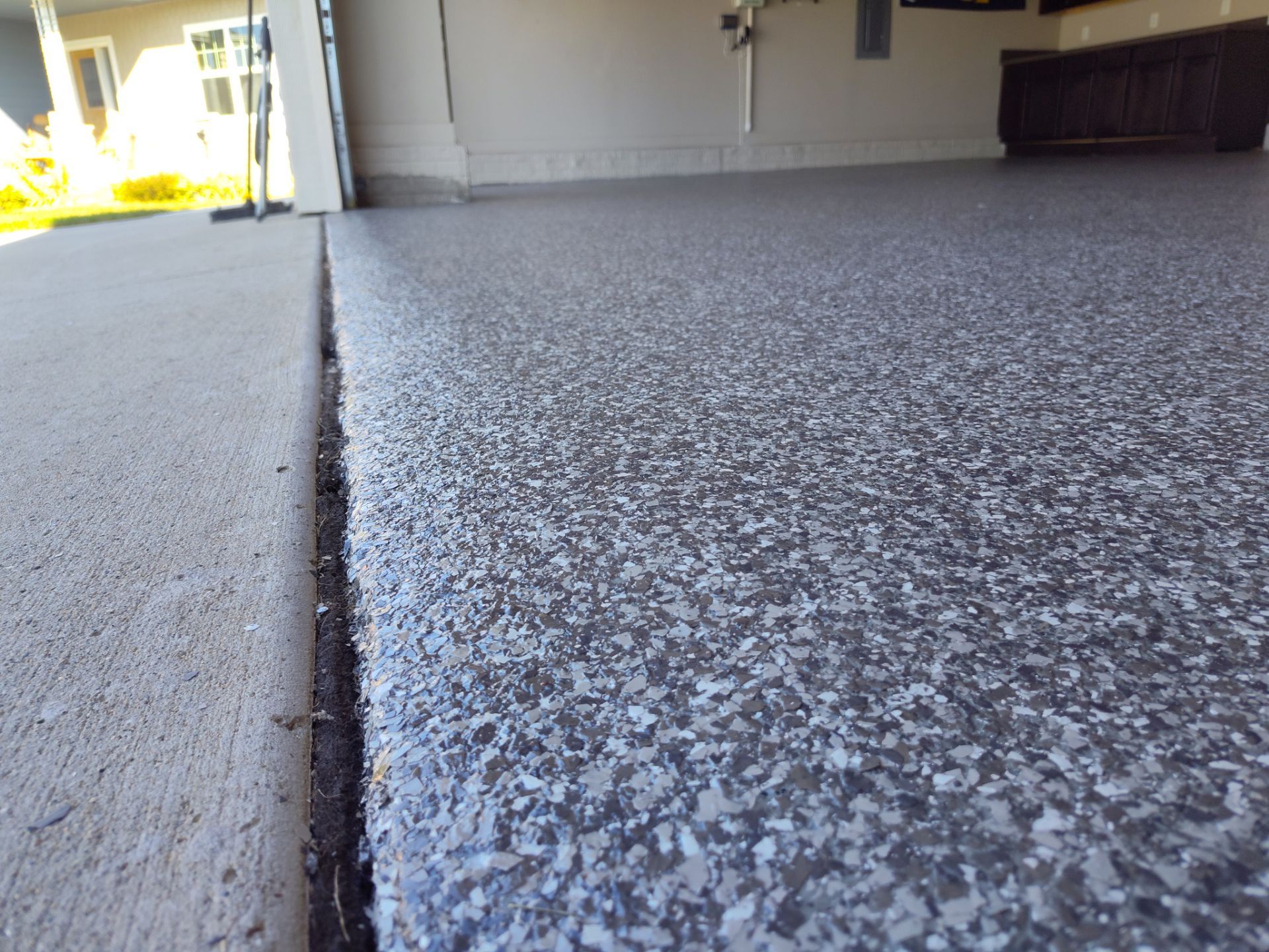 Another Garage Protected from Rock Salt & Chemicals by Revival Concrete Coatings, LLC