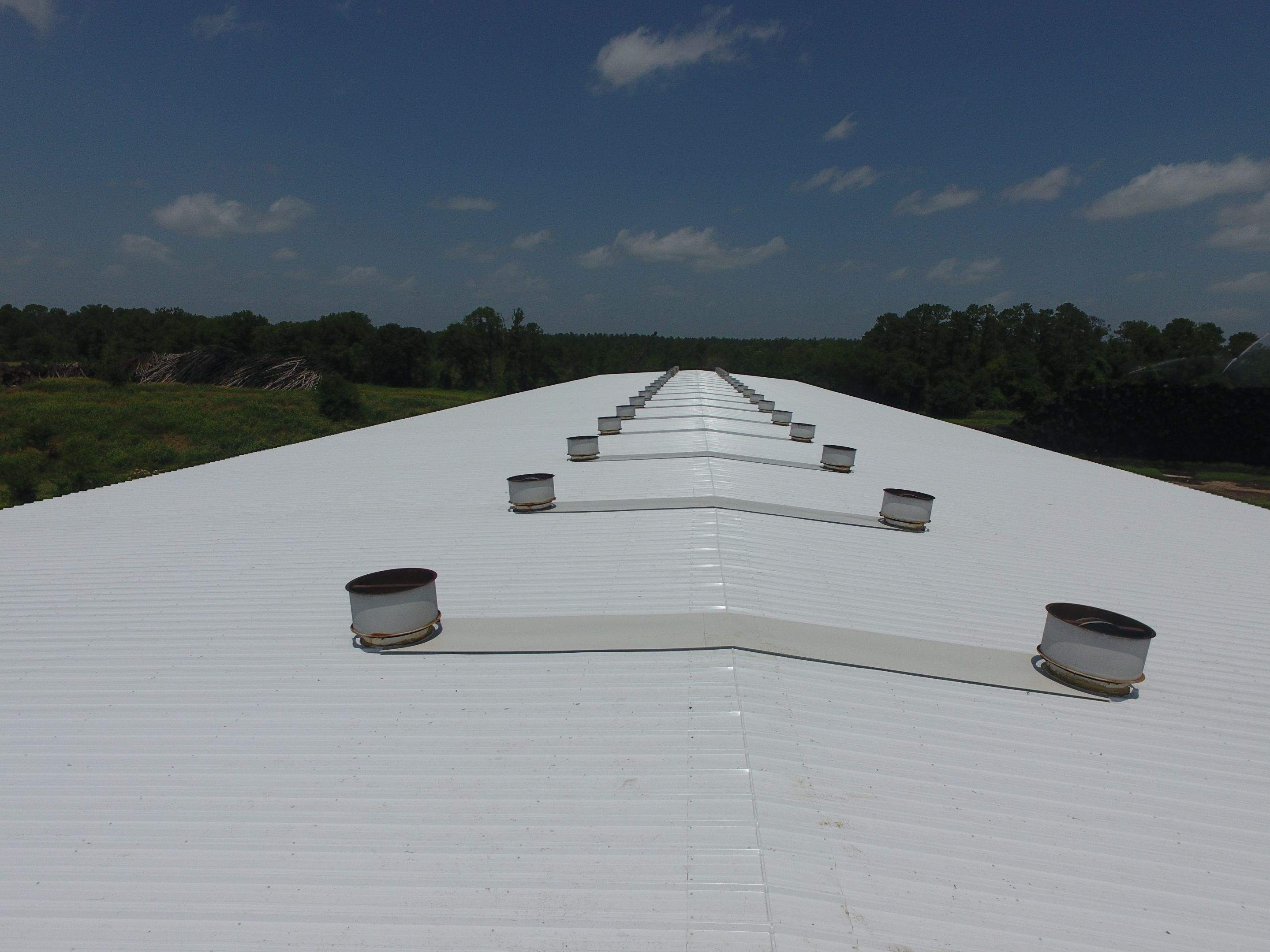 Commercial Roofing Installation using Aluminum Roofing panels by Hostetler Roofing