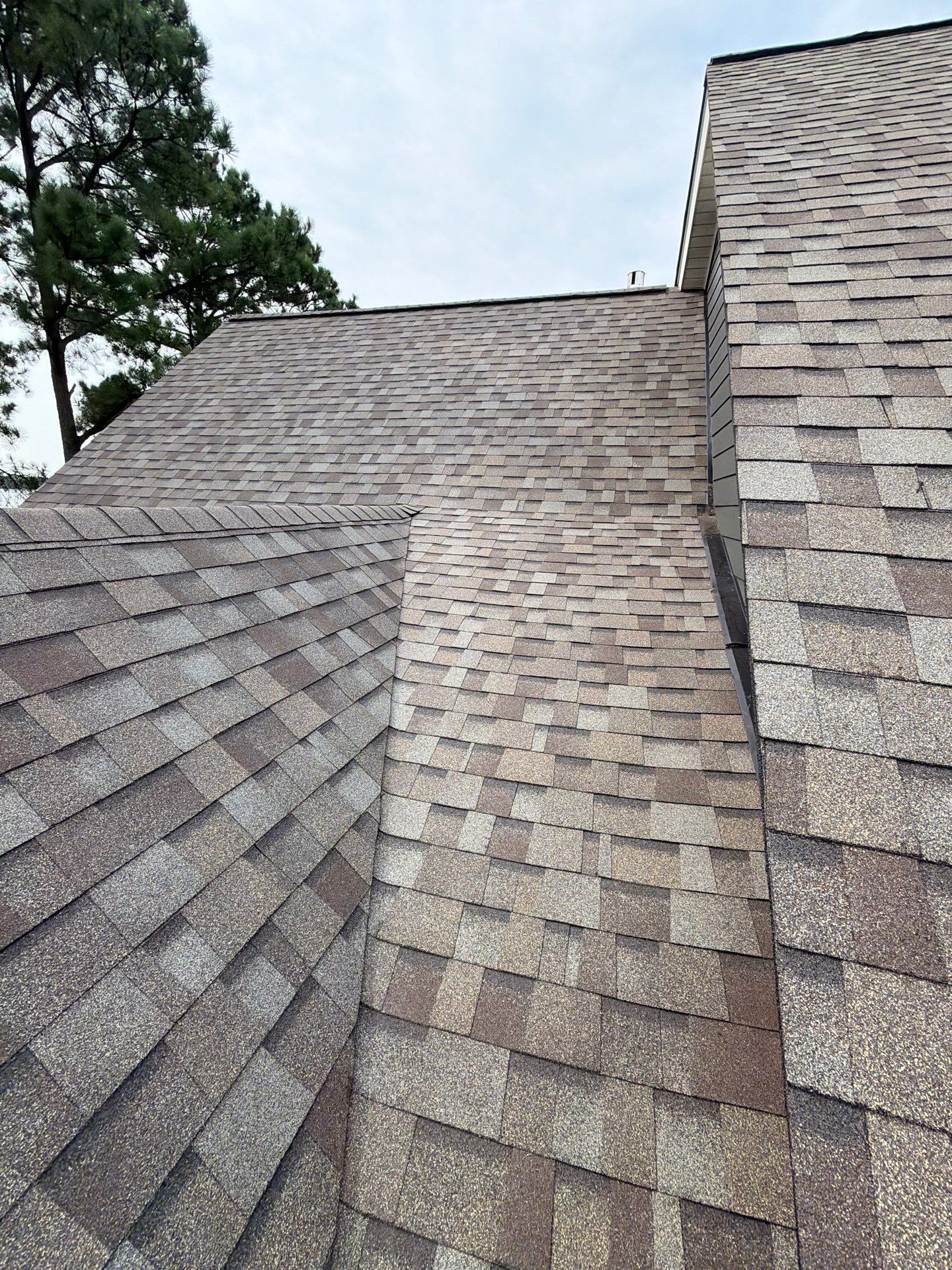 Roof Replacement and White Gutter Installation in Gloucester by Cade Construction