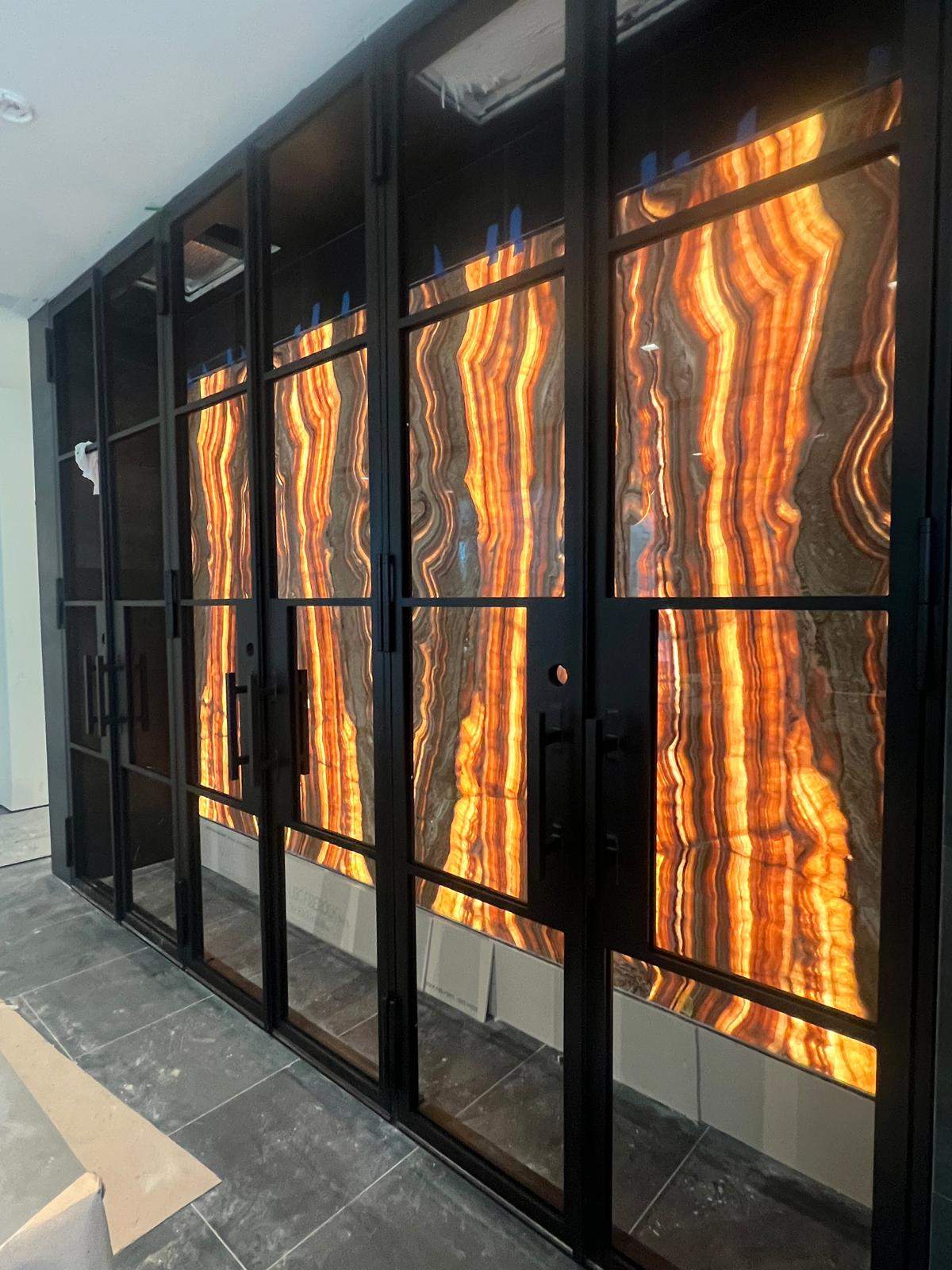 Custom Black-Framed Glass Wine Cellar Installation in Dallas by Solara Custom Living