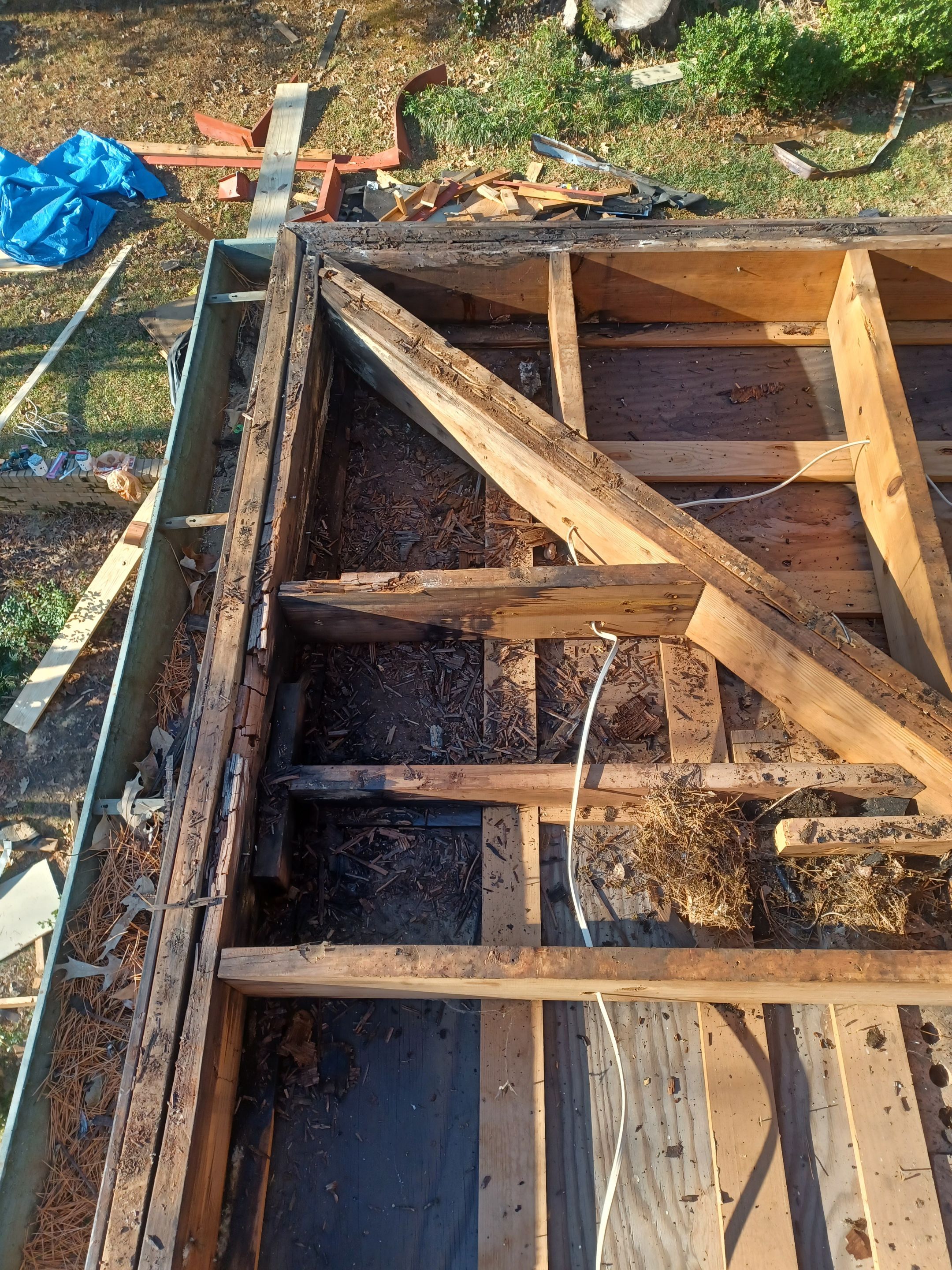 Residential Roofing Installation using PVC membrane and 24 gauge Standing Seam Metal by Hostetler Roofing