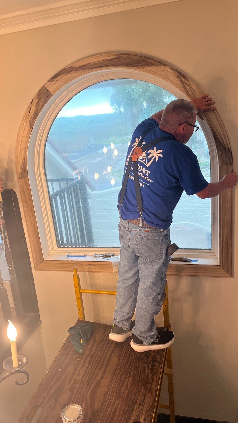 Installing Windows on a Submarine  by Bayfront Roofing and Construction