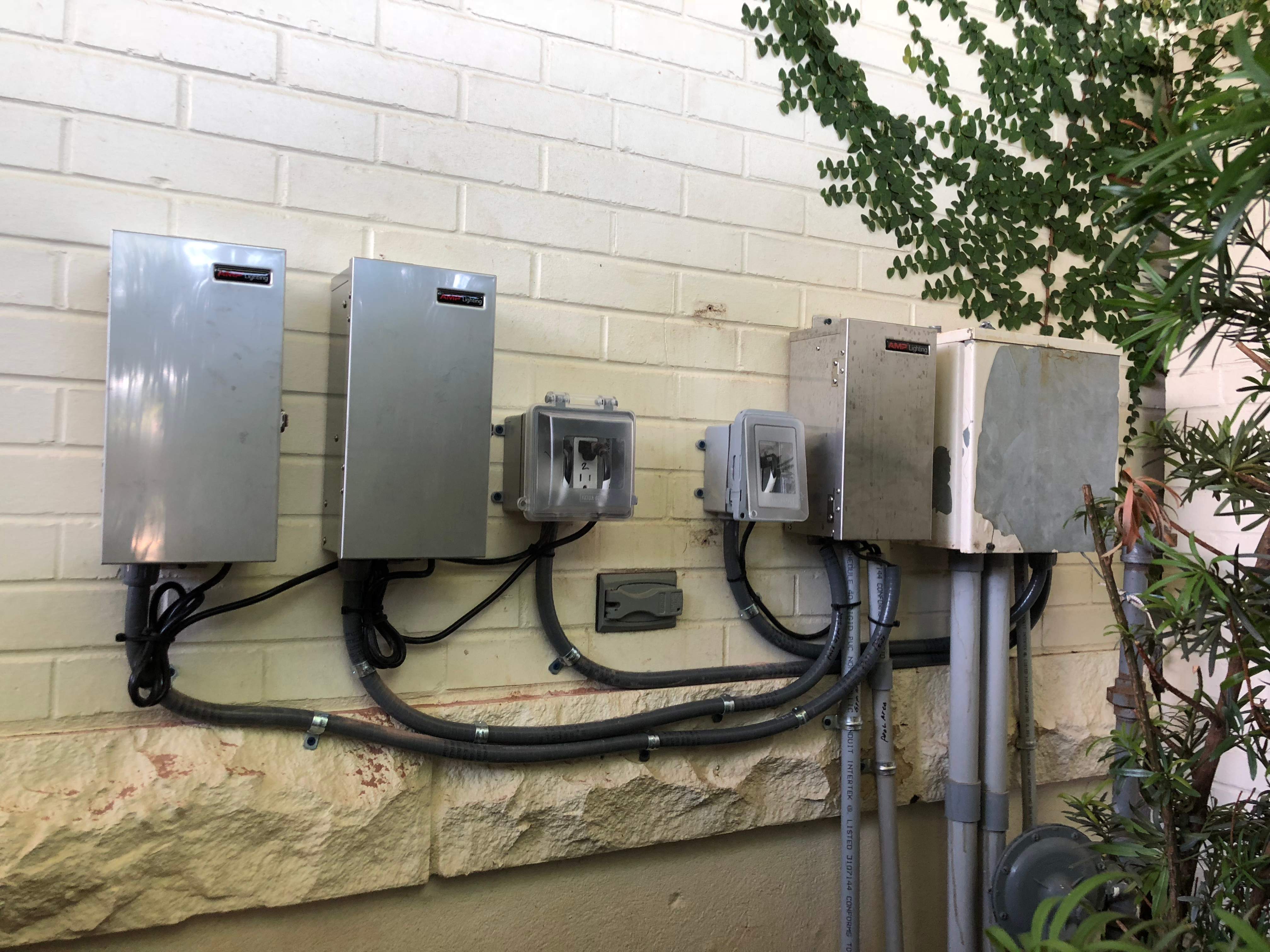 Austin Boat Dock + Outdoor Landscape Lighting by Outdoor Lights + Shades