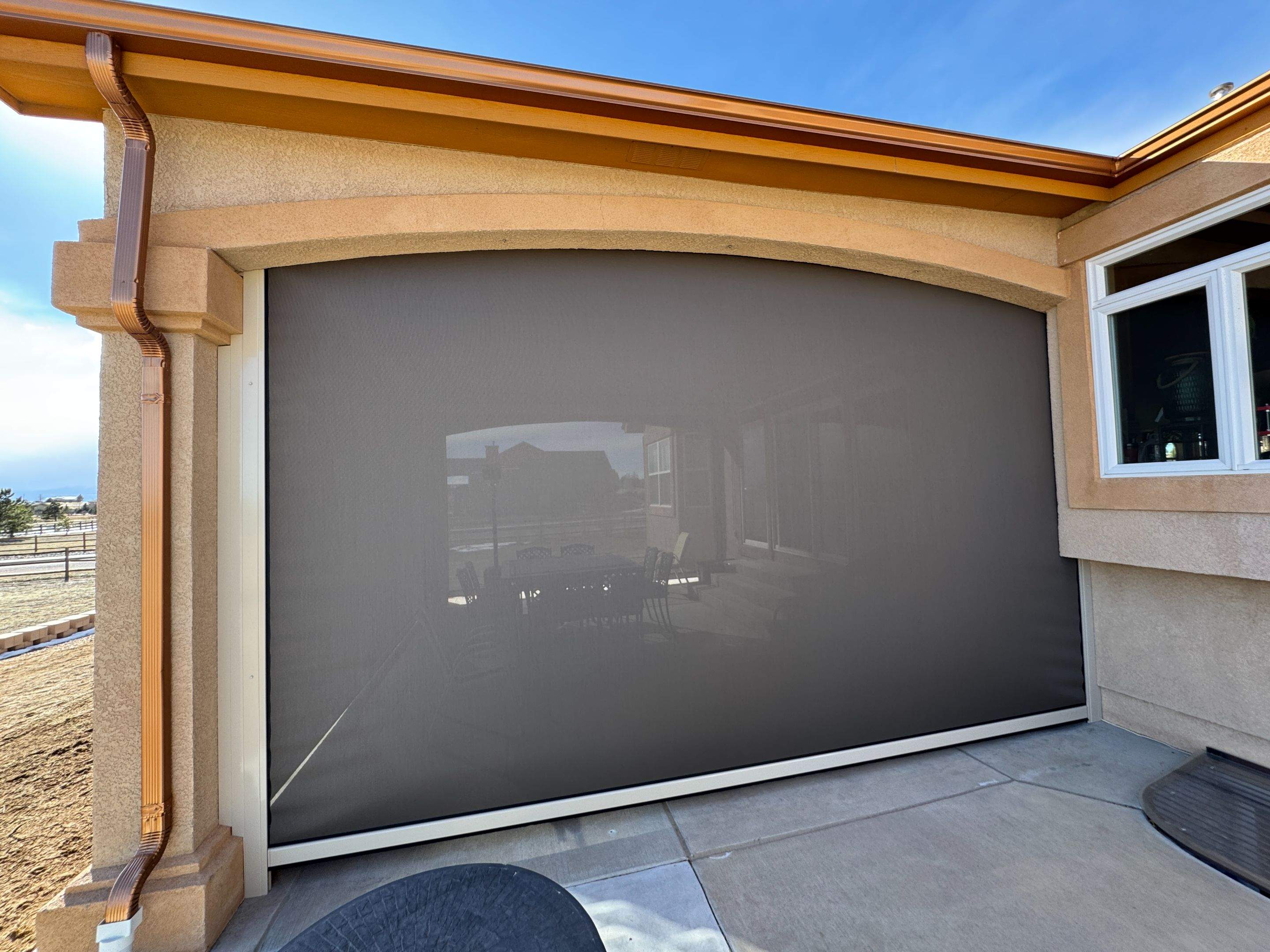 Motorized Screens using Progressive MagnaTrack Screens by Outdoor Solutions Colorado