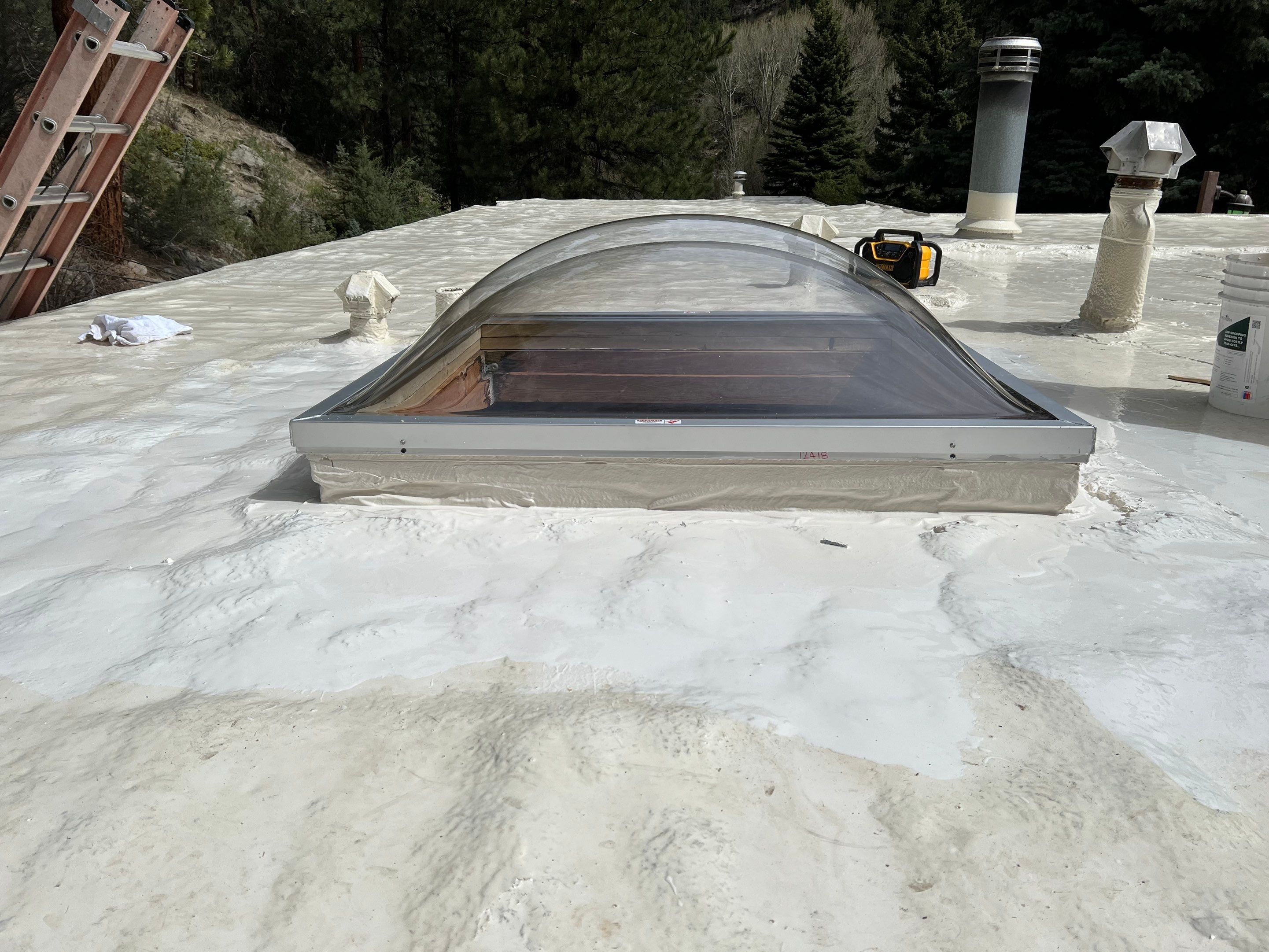 Commercial Roofing Installation using CASTAGRA ECODUR COATING by A to Z Roofing