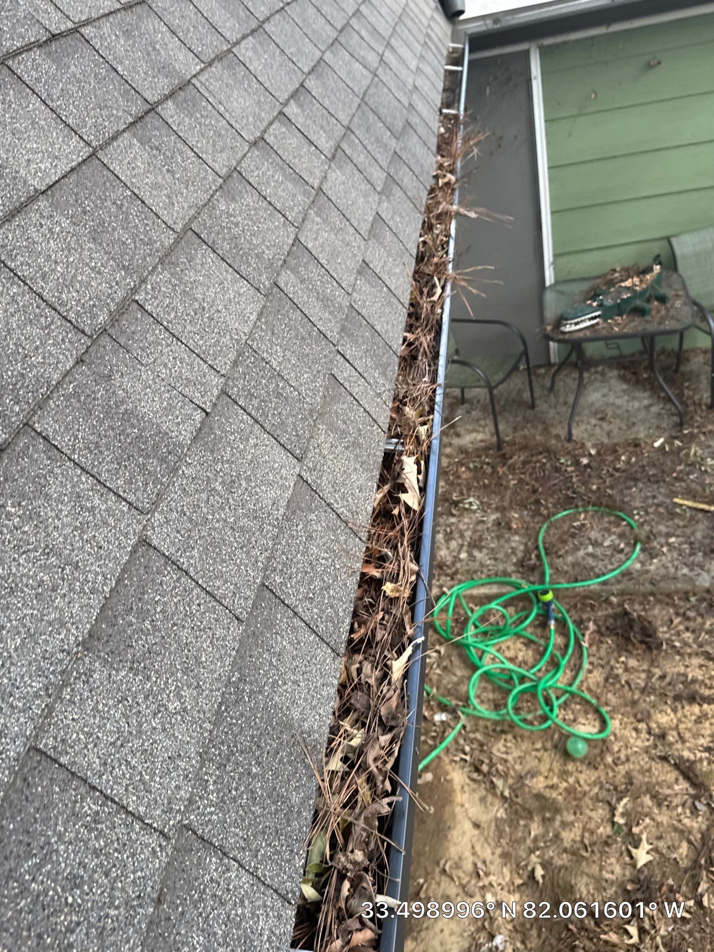 Commercial gutter cleaning Augusta before photo with filled gutters