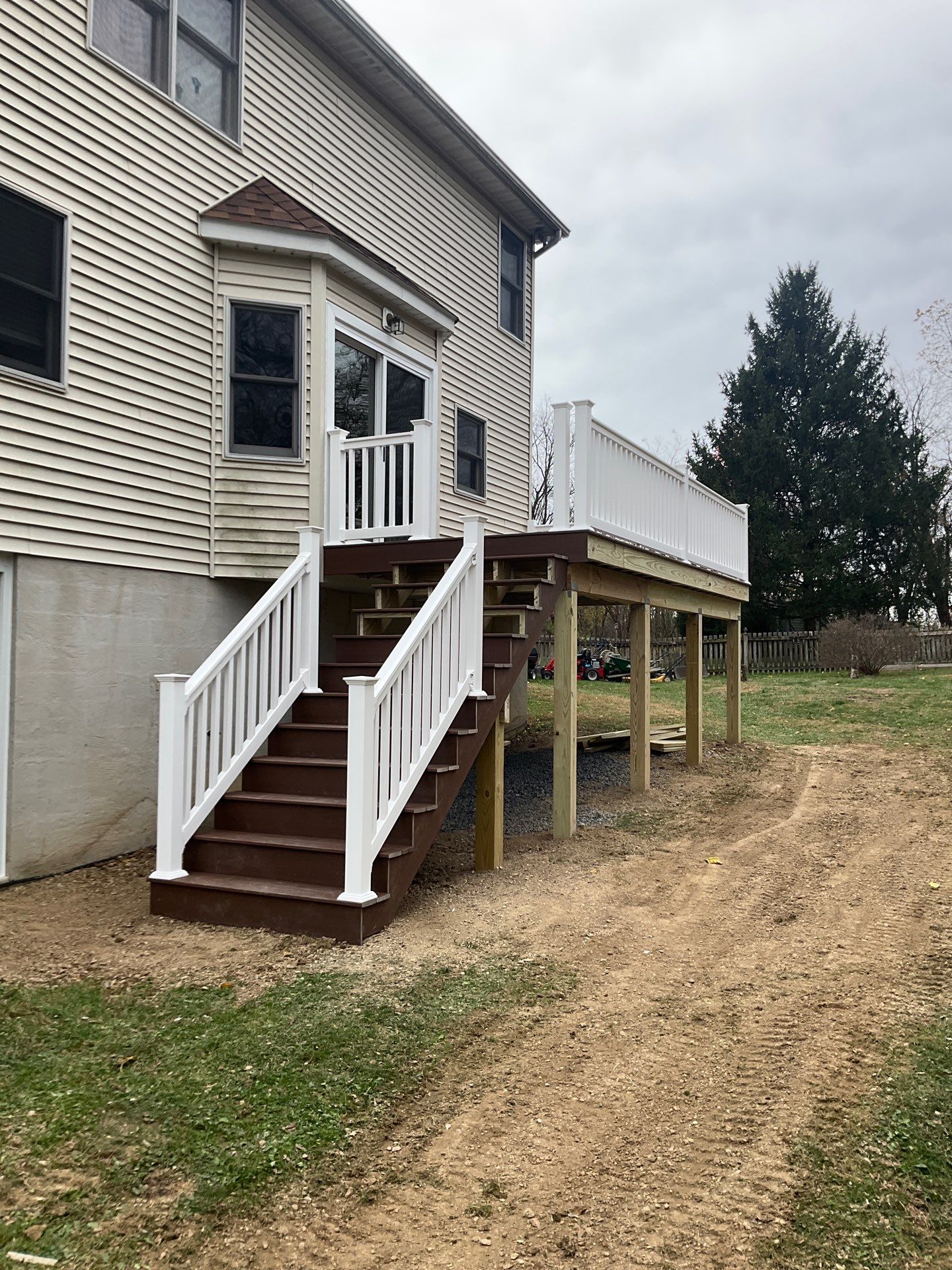 Patio door replacement and deck upgrade by Esh Builders