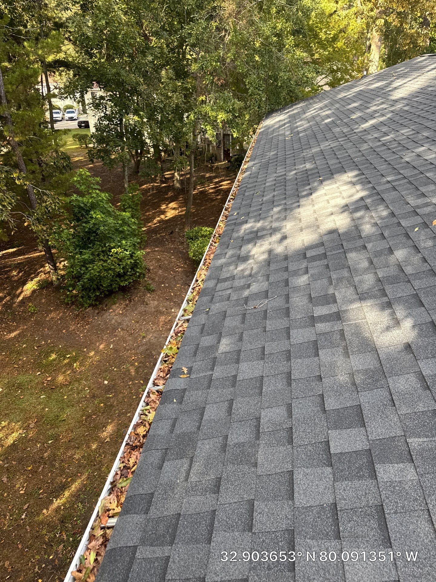 Commercial gutter cleaning Charleston before photo with filled gutters