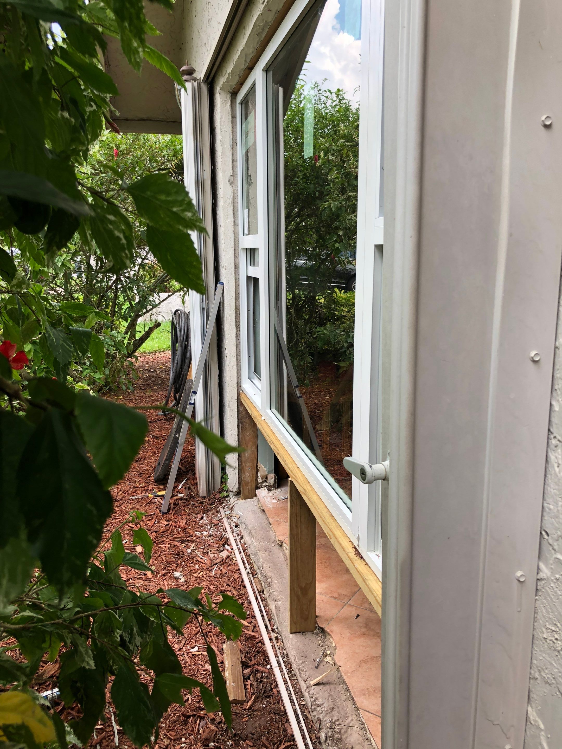 Impact Window Installation & Sliding Glass Door to Window Conversion – Coconut Creek, FL by The Door Doctor of South Florida, Inc.