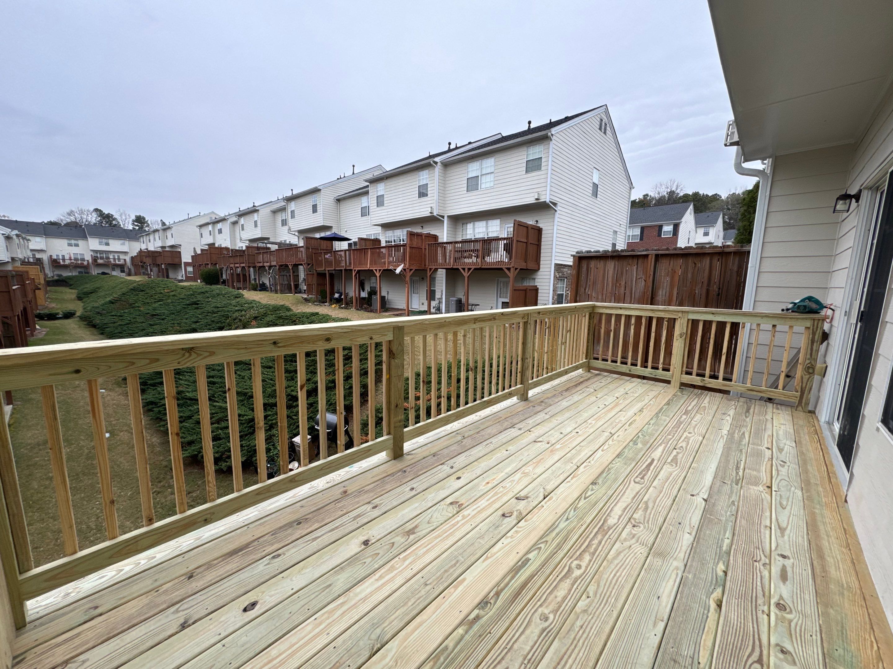 New Second-Story Pressure-Treated Wood Deck Installation in Atlanta by Swift Home Renovations