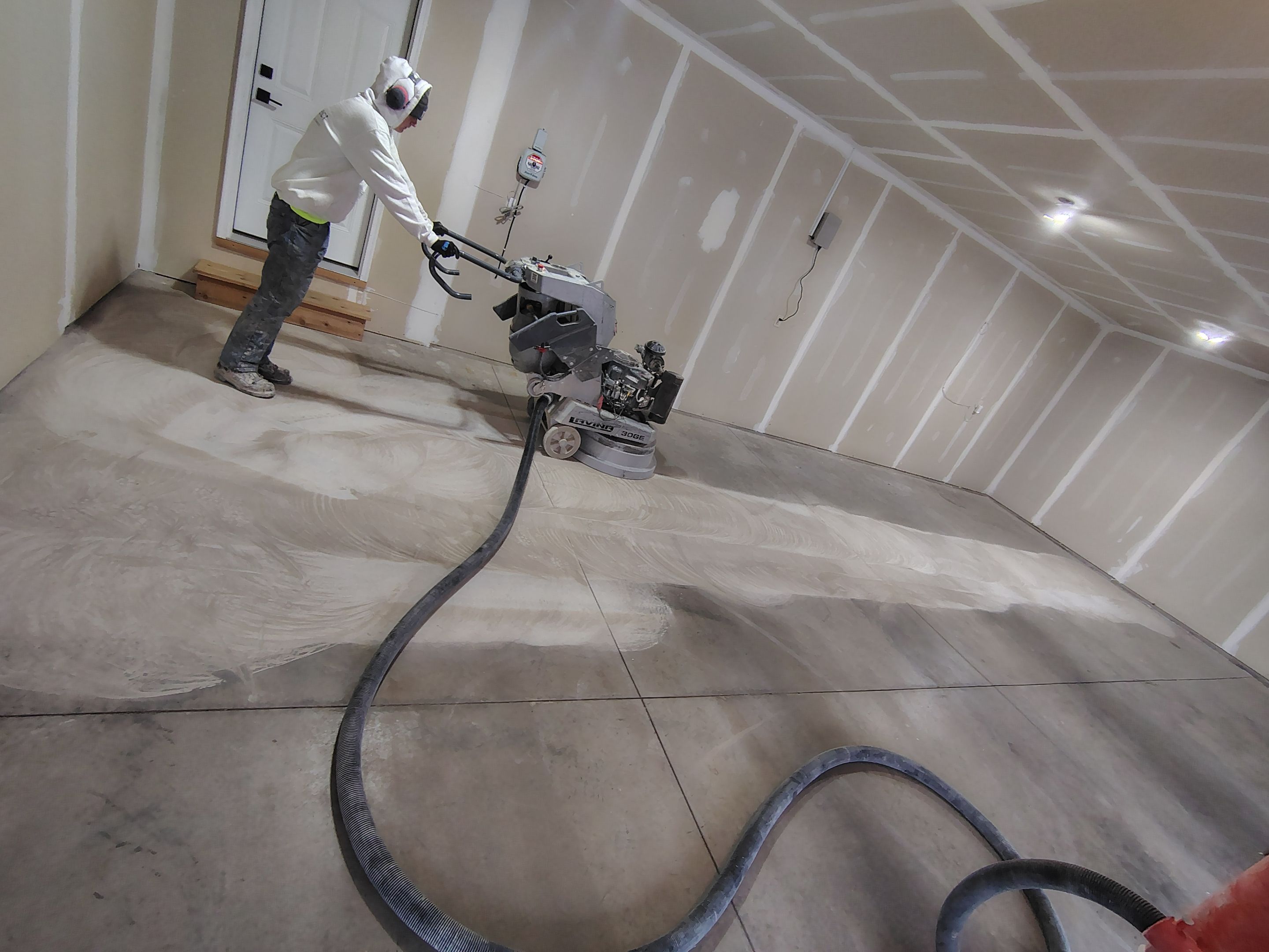Epoxy Garage Floor Coating with Decorative Flake in Harrisburg by Select Painting, Coatings & Garage Cabinets
