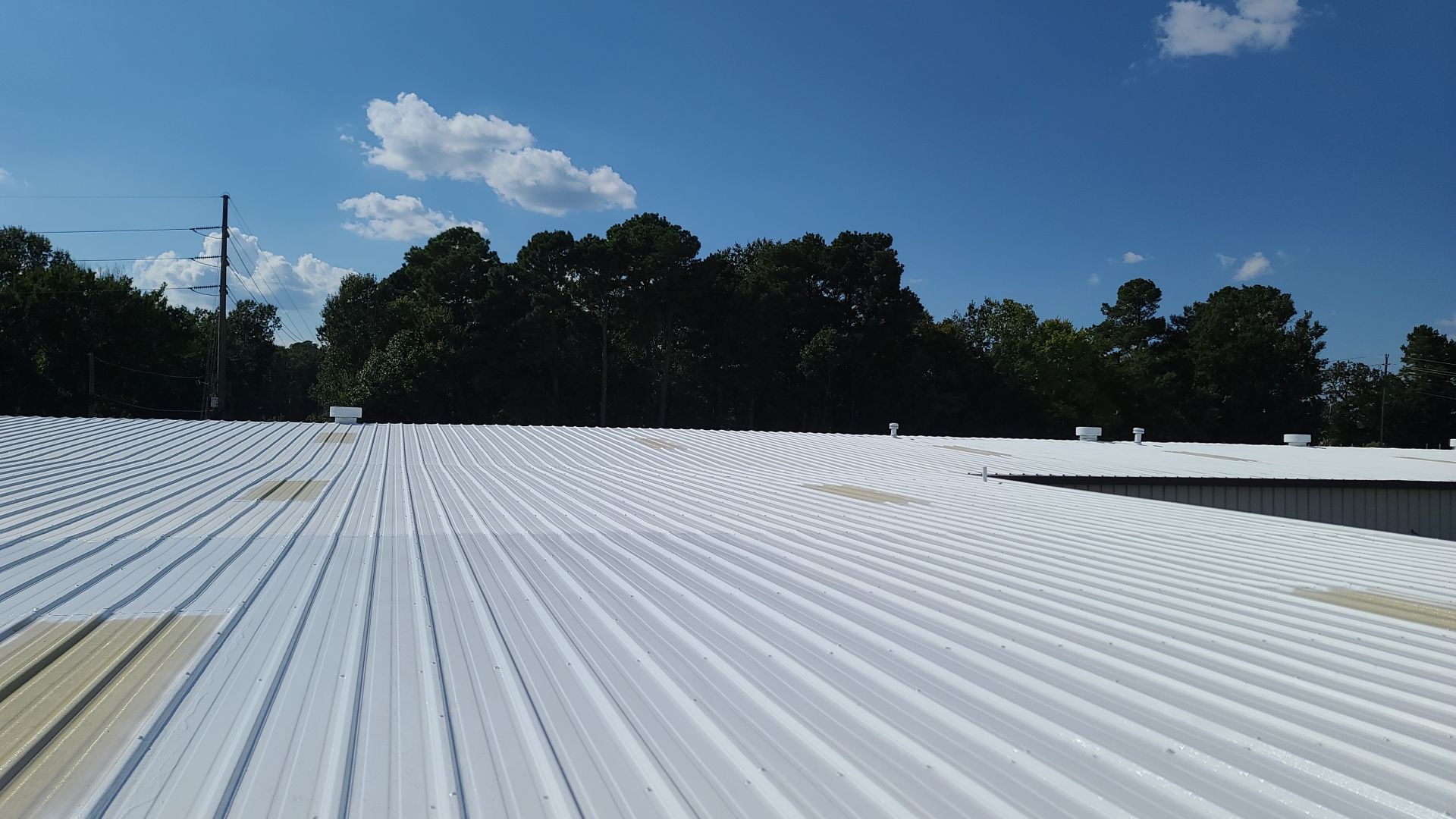 Commercial Metal Restoration System using Aldocoat Coatings by Hostetler Roofing