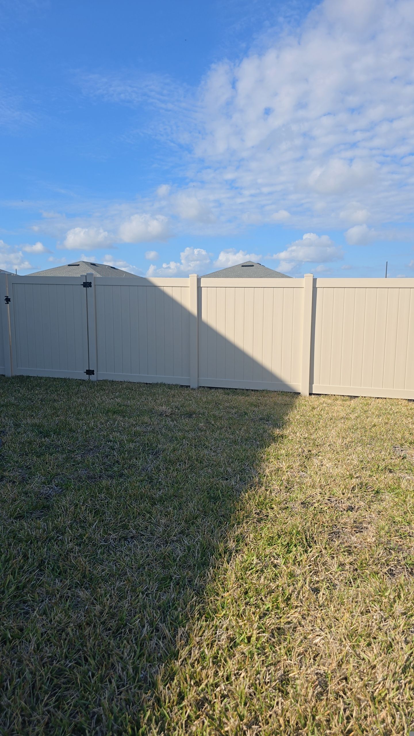 Tan Vinyl Fence in West Port by True Fence LLC