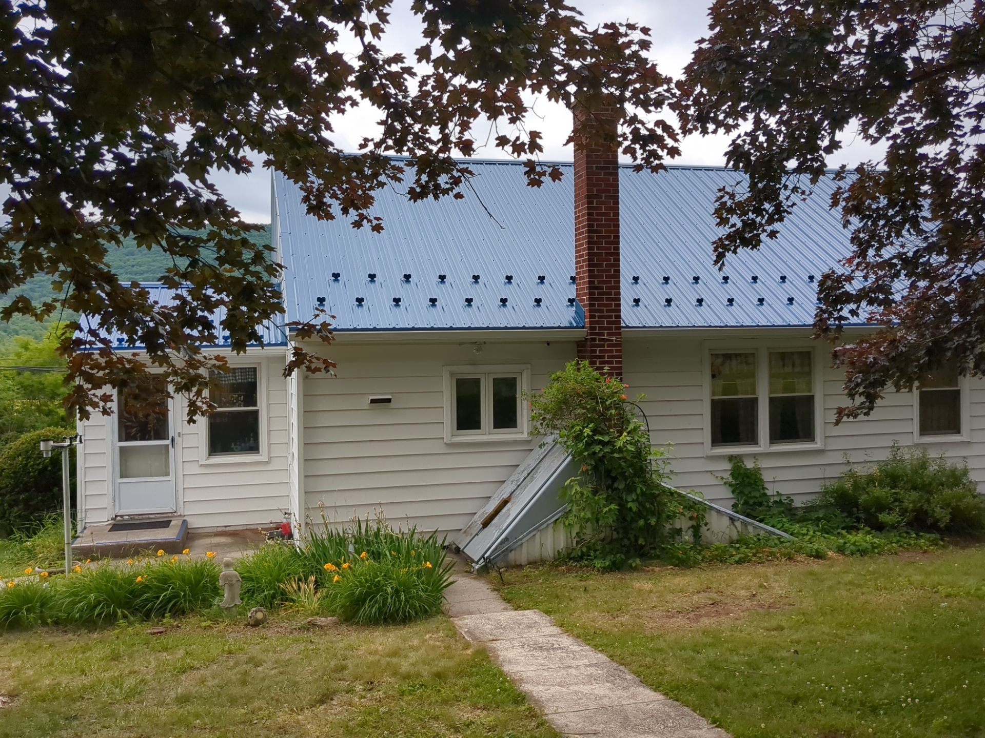 Church Parsonage Metal Roof Replacement by Esh Builders