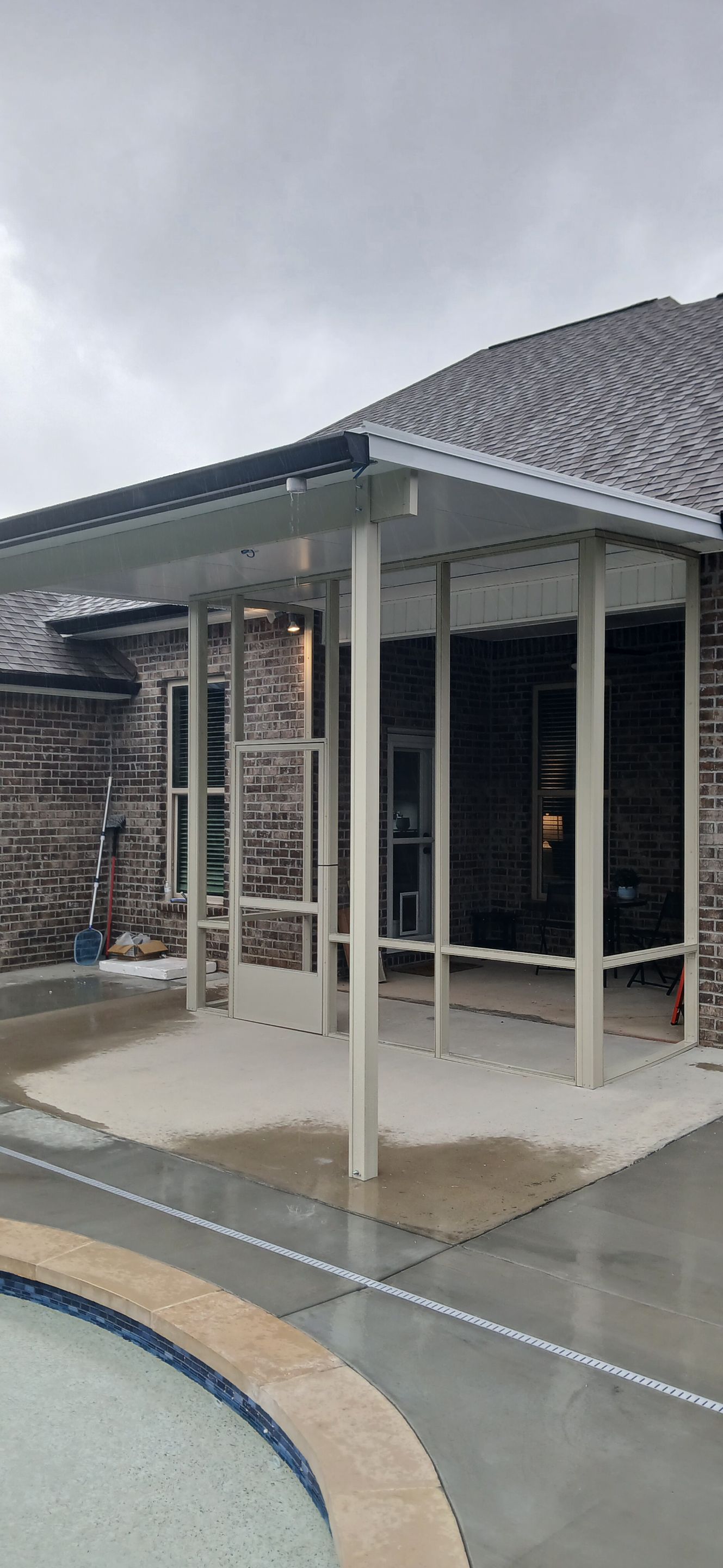 Screenroom Under Existing Canopy by Titan Sunrooms