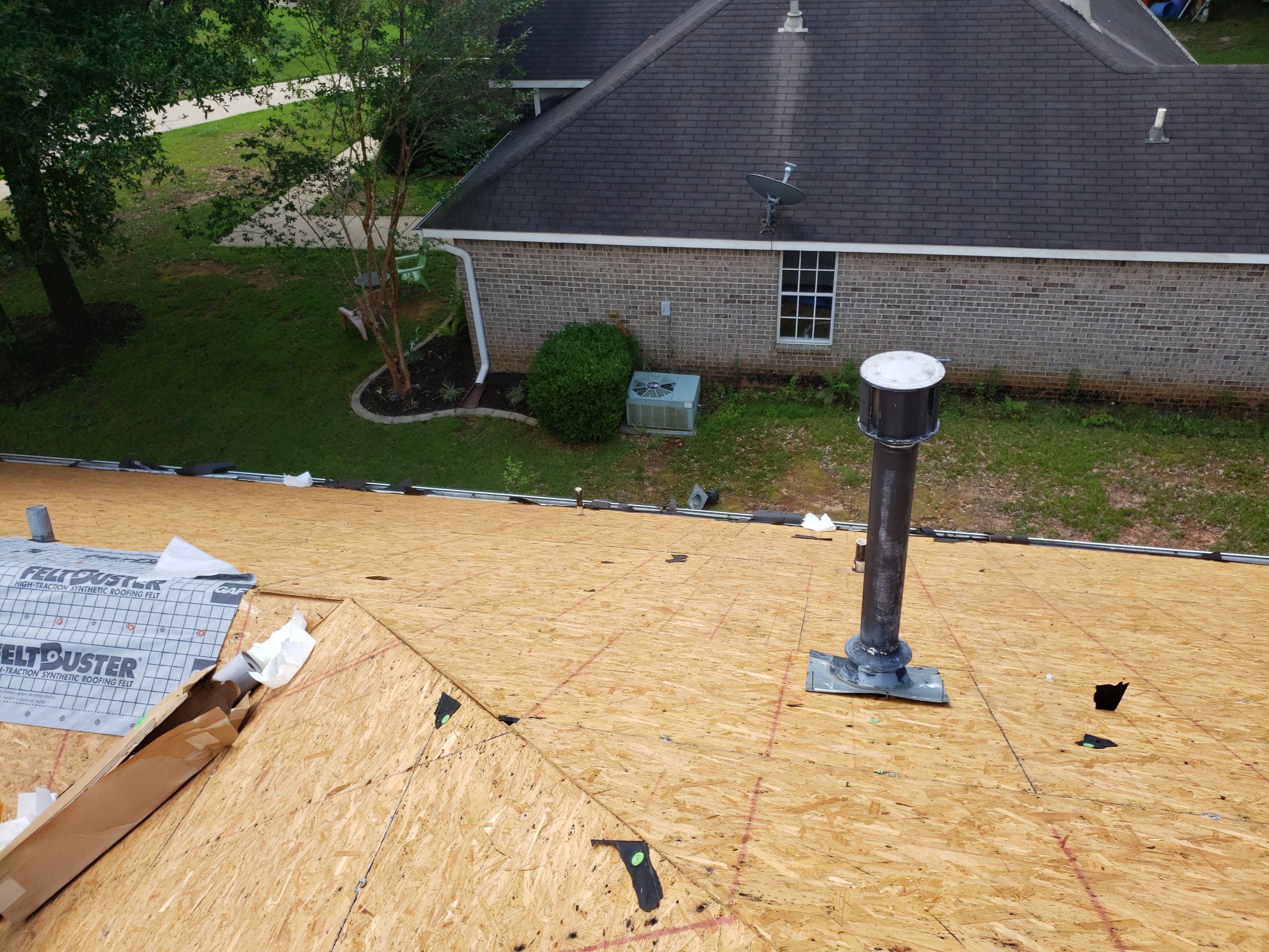 Residential Roofing Installation using Roof Replacement by American Roofing & Construction LLC