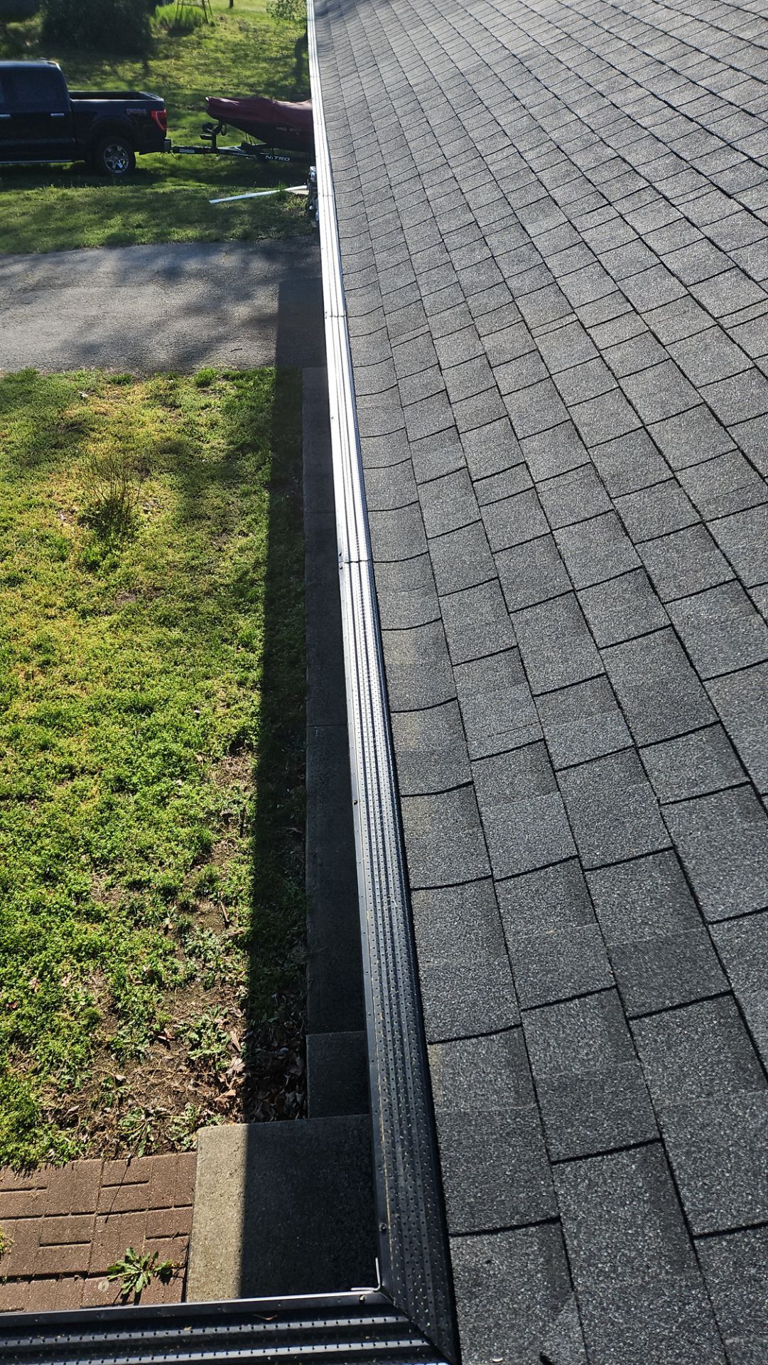 Residential Roof + Gutters & Downspouts & Gutter Guards Install  by Titan Commercial & Residential Roofing 