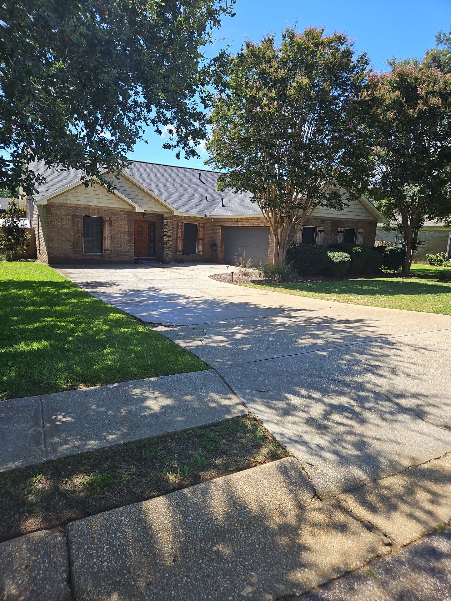 Driveway Sidewalk and Building Exterior after Cleaning