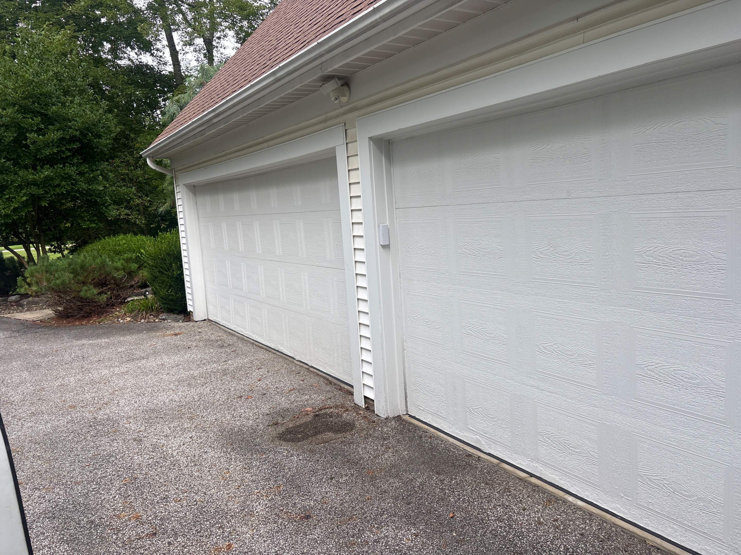 White Raised Panel Sectional Garage Door Installation in Solon by Ohio Garage Door Repair