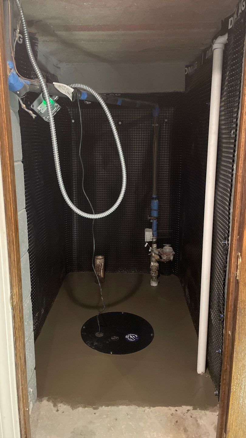 Interior Drain Tile & Sump Pump System in West Minneapolis by Waterproofing Northeast