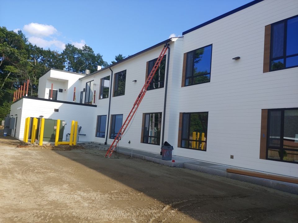 Norwell, MA Gutter Installation using Half Round Aluminum Gutter at The Cordwainer by Gutter Pro Enterprises