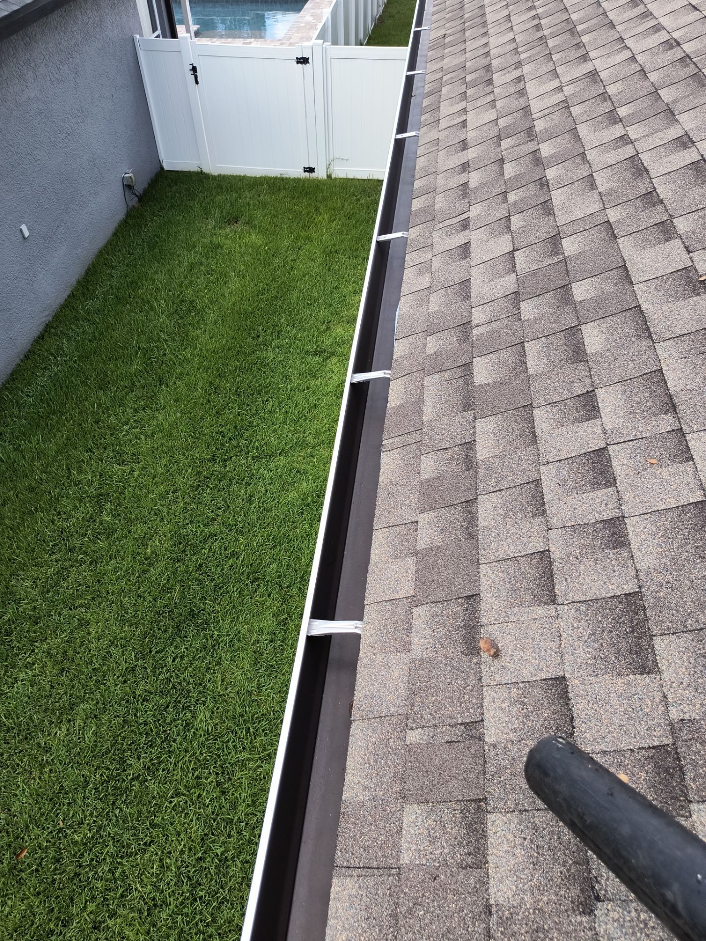 Professional Gutter Cleaning in Lutz FL by Gutter Professors