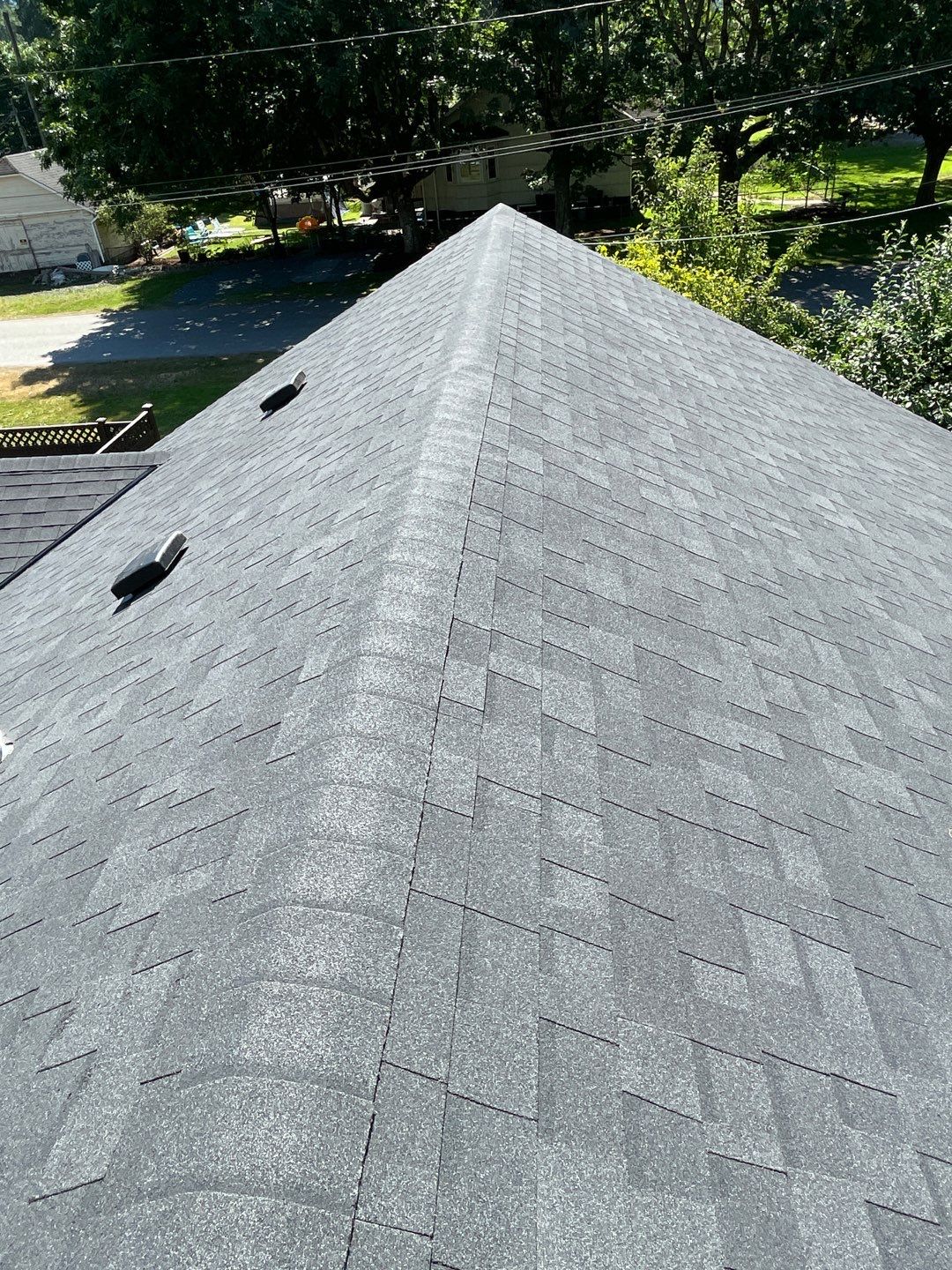Residential Roofing Installation using OC Oakridge shingles by Top Notch Roofing Inc