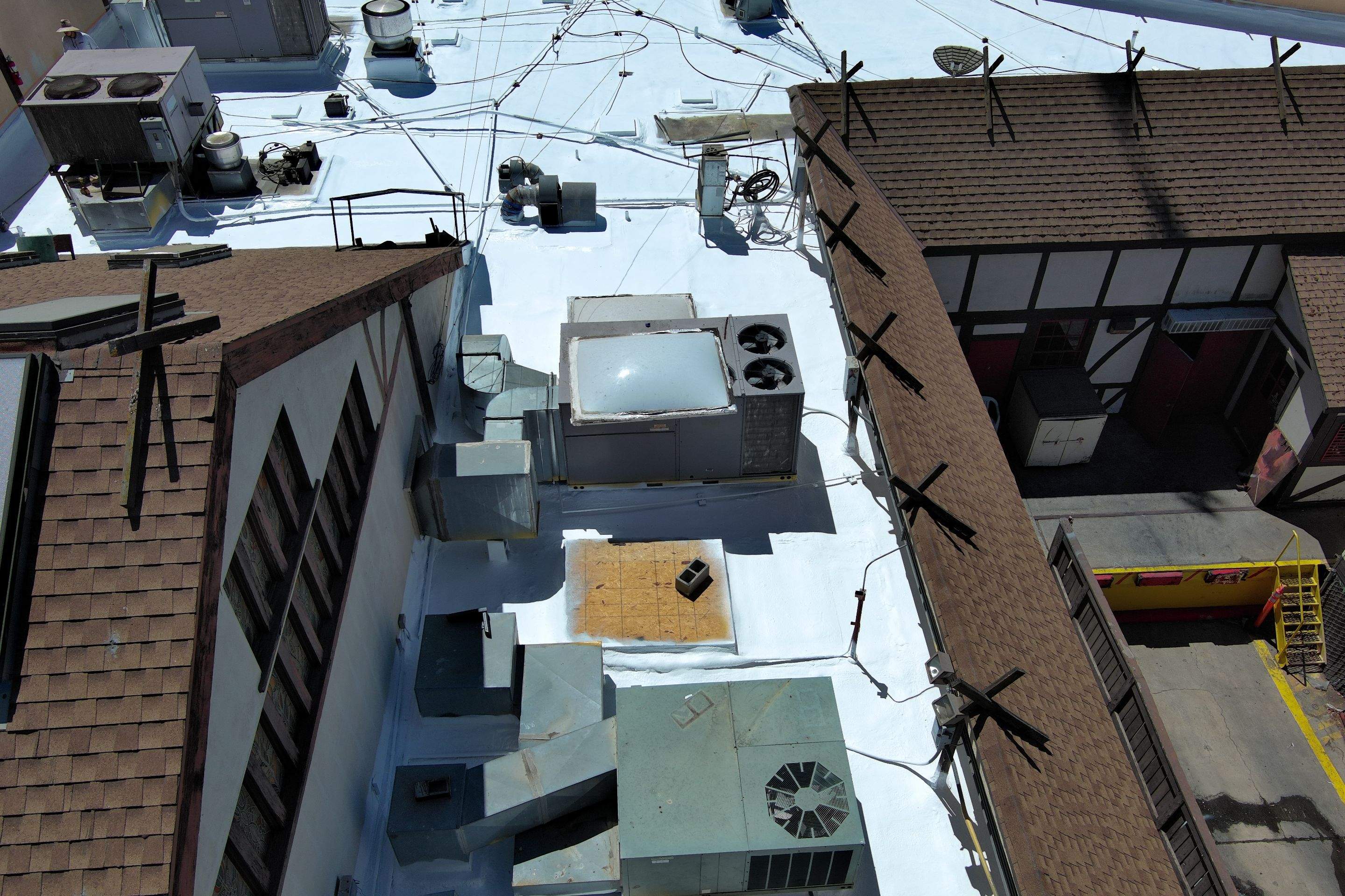 Spray foam and coatings using General Coatings acrylic coatings and spray foam by Straight Edge Roofing Inc