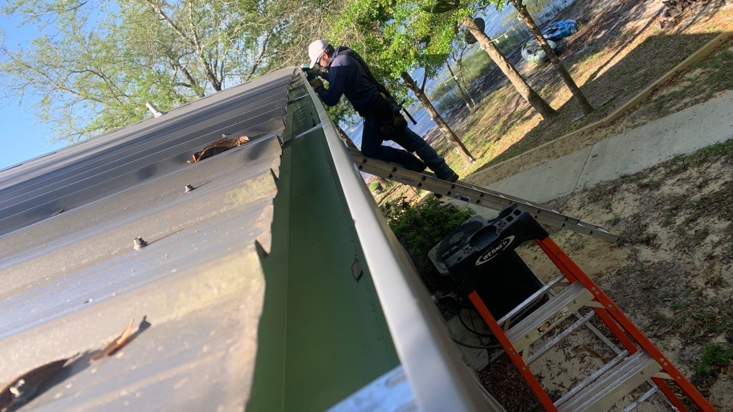 Gutter Installation Using Charcoal Grey K-Style Seamless Aluminum Gutters by Gutter Professors
