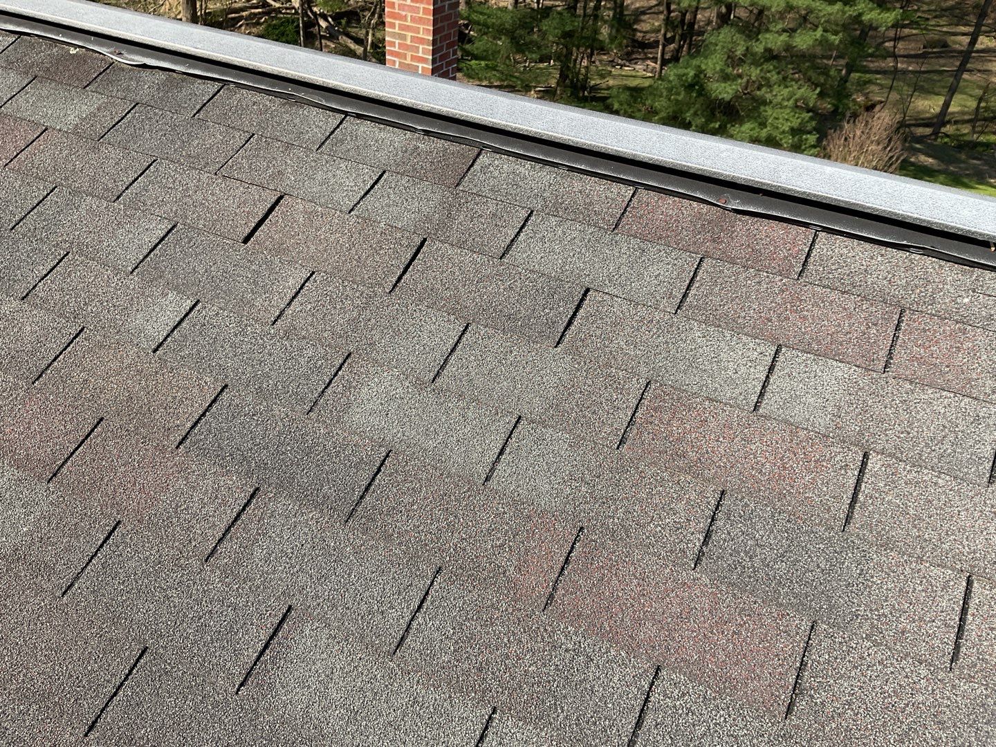 Residential Roofing Installation using Landmark Shingles Color Weatherwood by Alpha Design Services