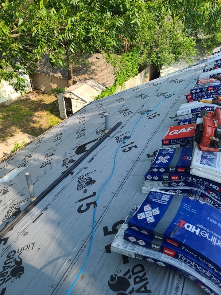 Impact Resistant Roof Replacement and Skylight Project in Norman Oklahoma by McCann's Roofing and Construction